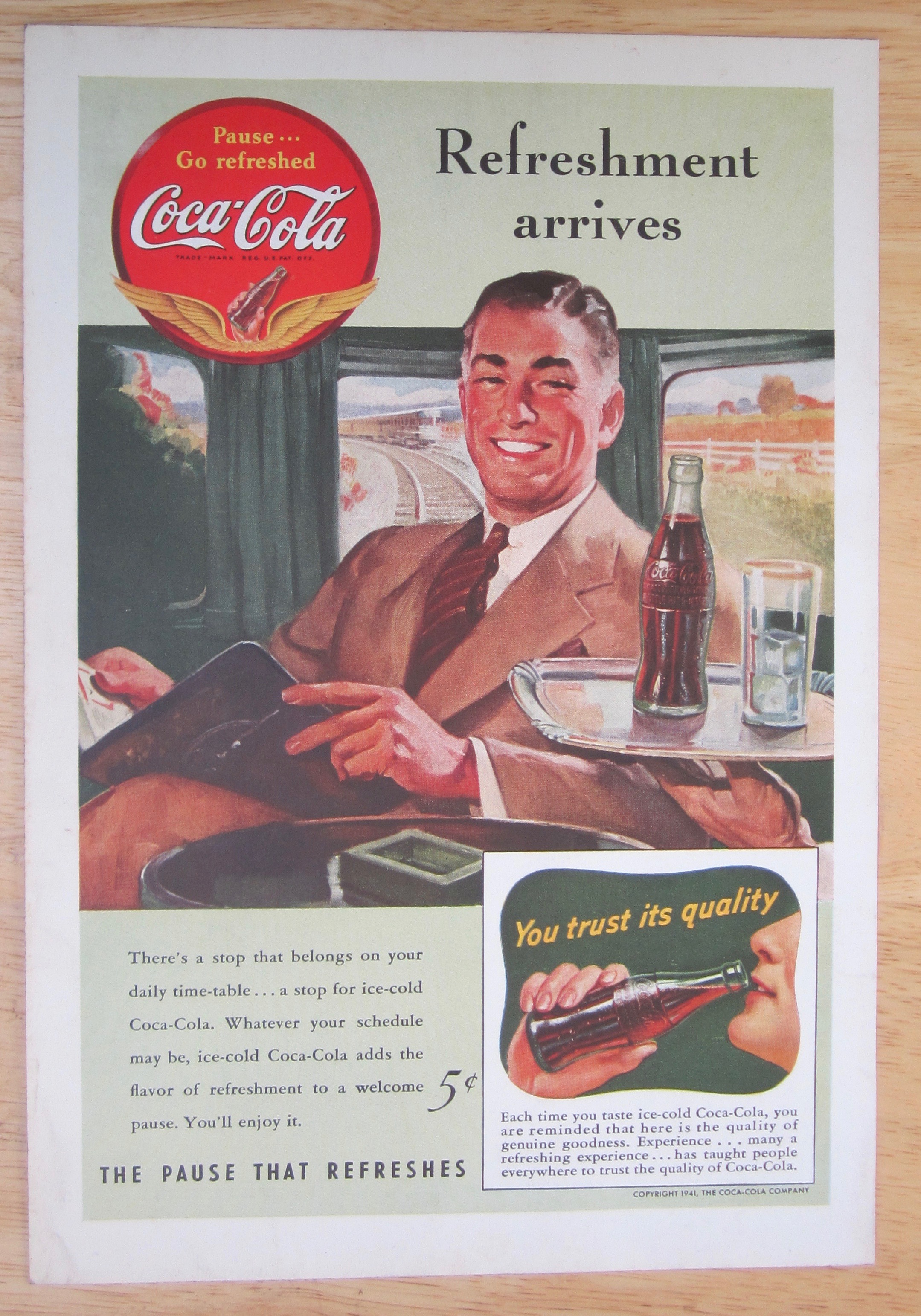 1941 Coca Cola w/Man Sitting on a Train Enjoying a Coke
