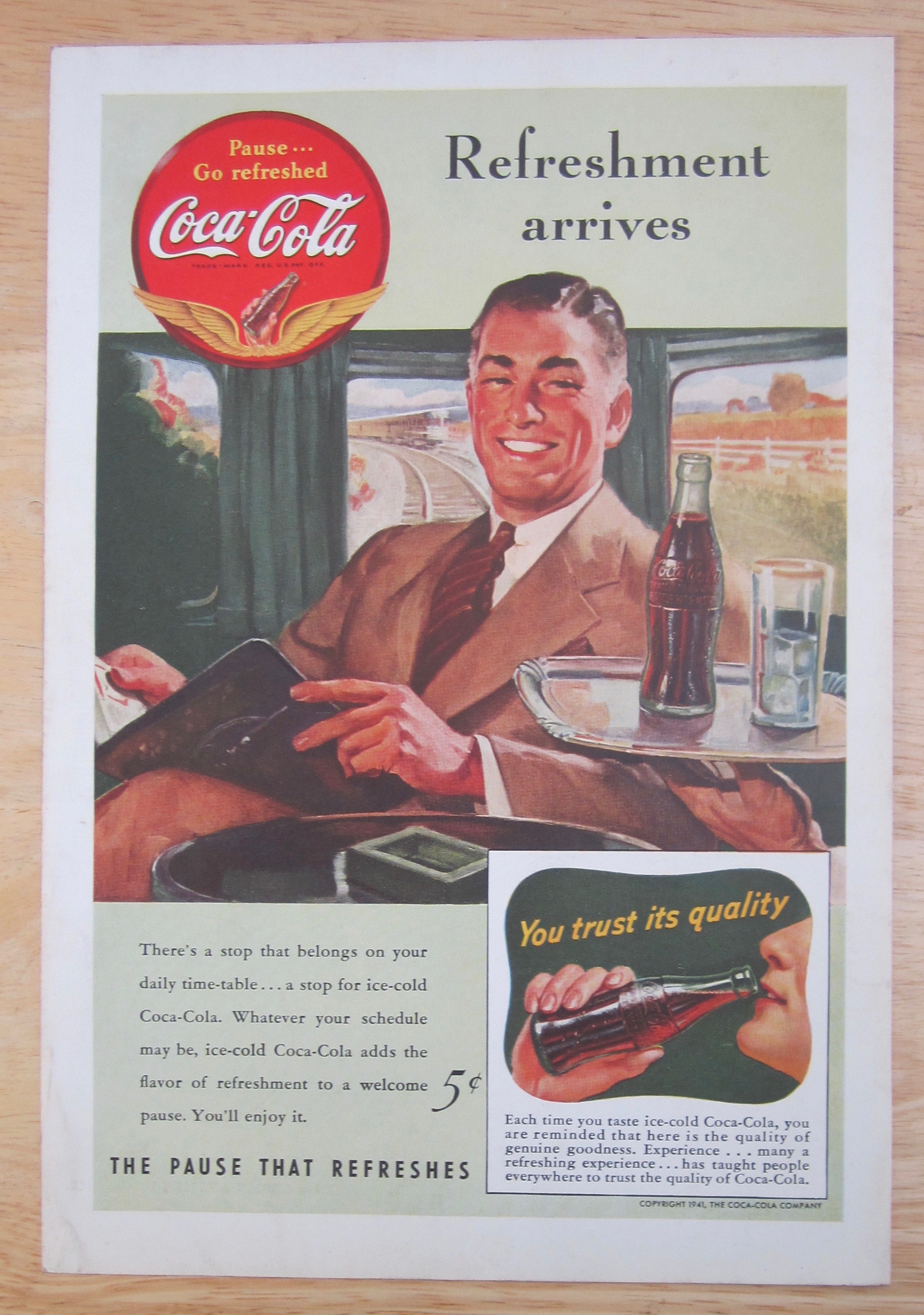 1941 Coca Cola w/Man Sitting on a Train Enjoying a Coke