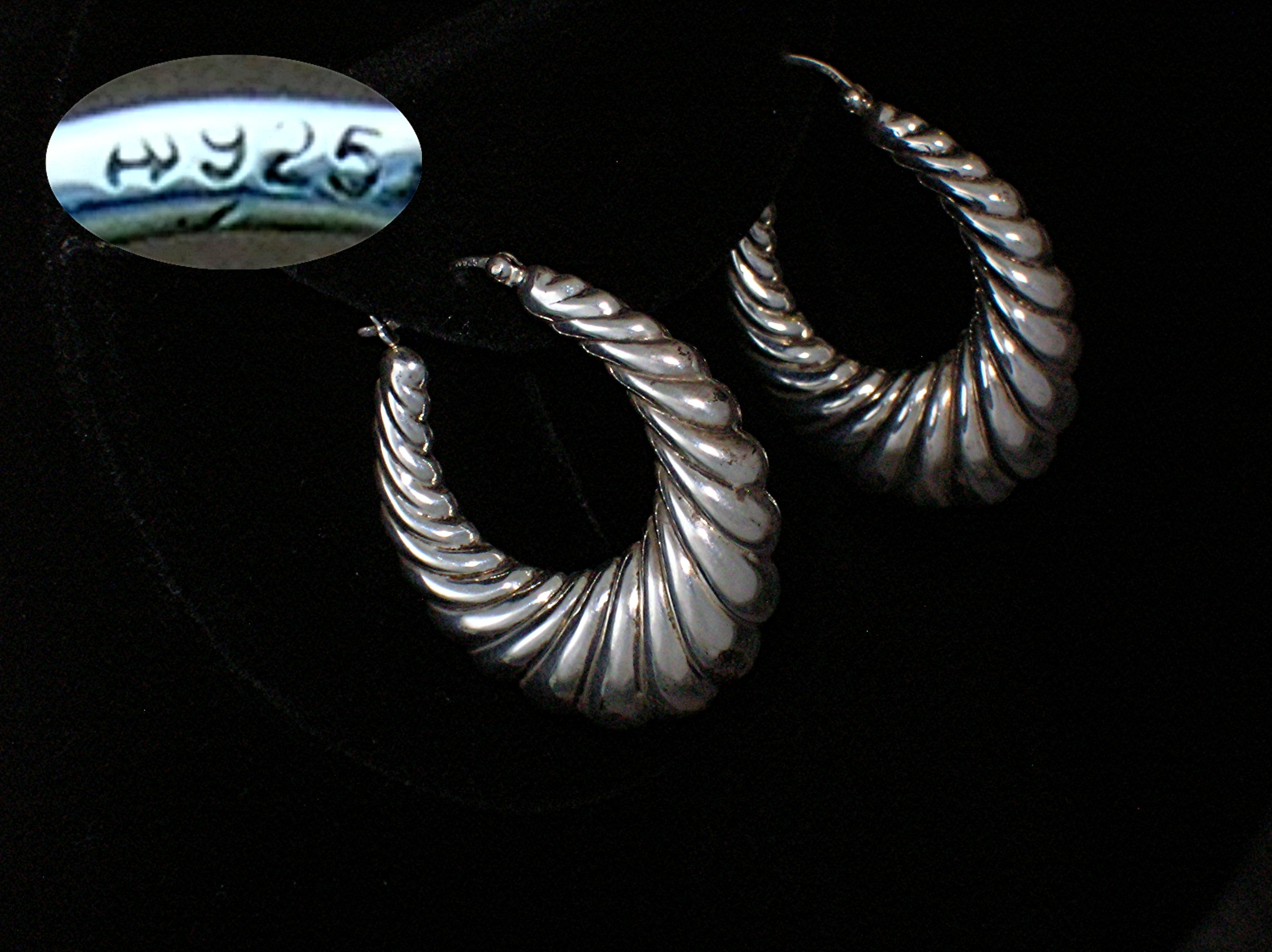 Sterling Silver Pierced Shrimp Style Earrings.