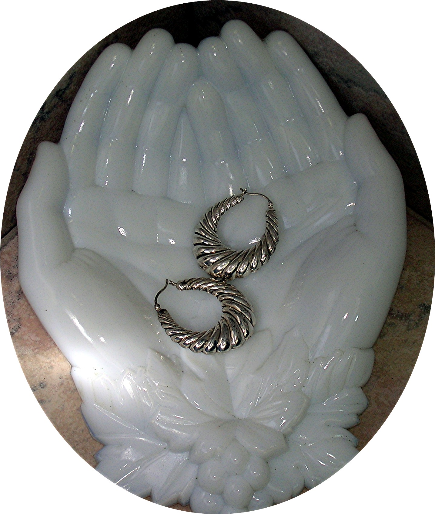 Sterling Silver Pierced Shrimp Style Earrings.