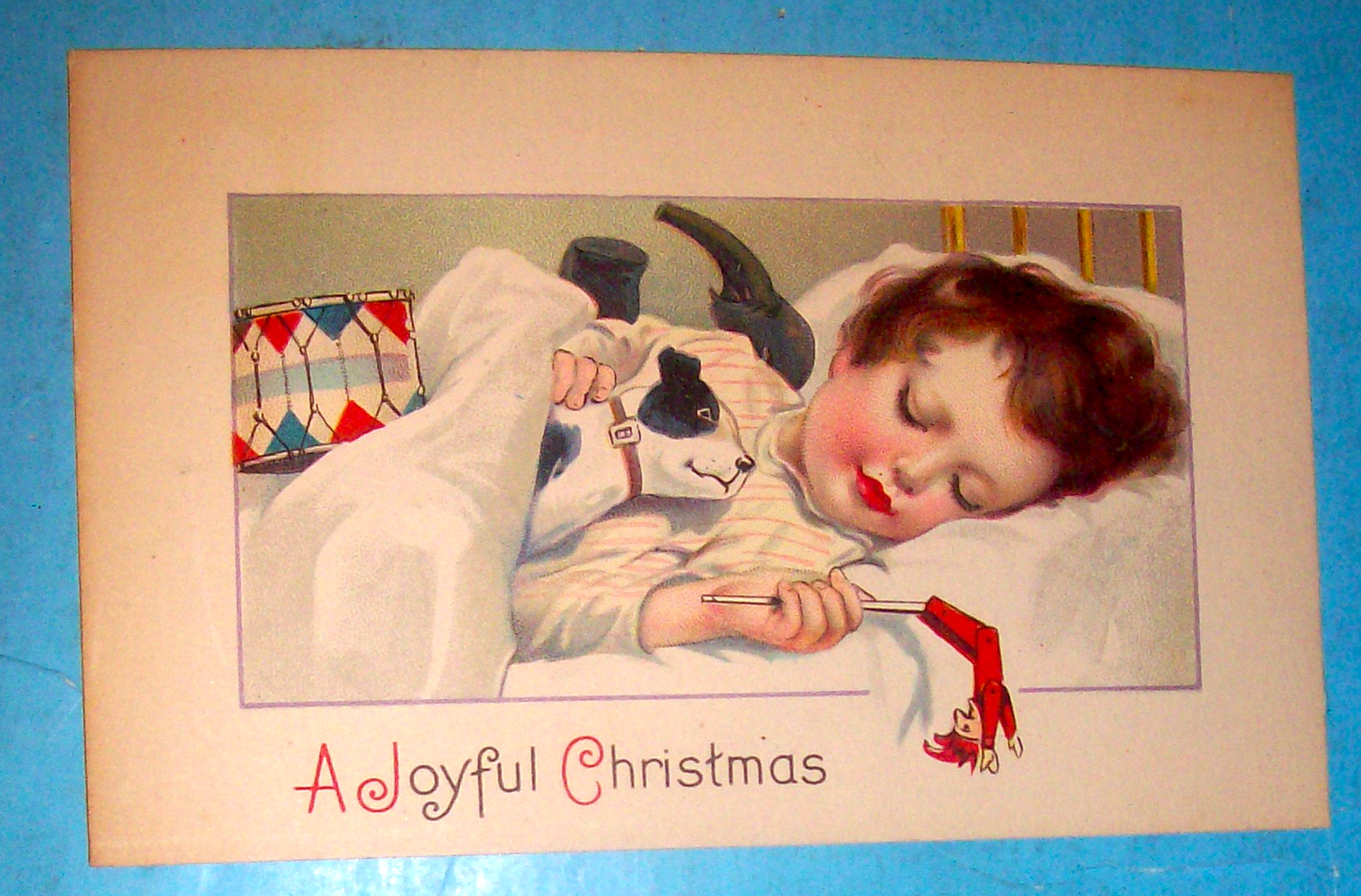 A Joyful Christmas Postcard with Little Girl Sleeping