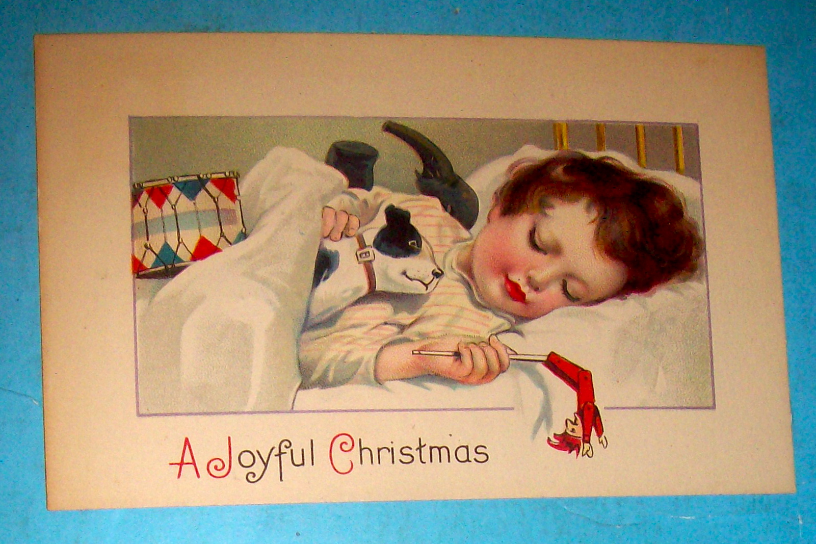 A Joyful Christmas Postcard with Little Girl Sleeping