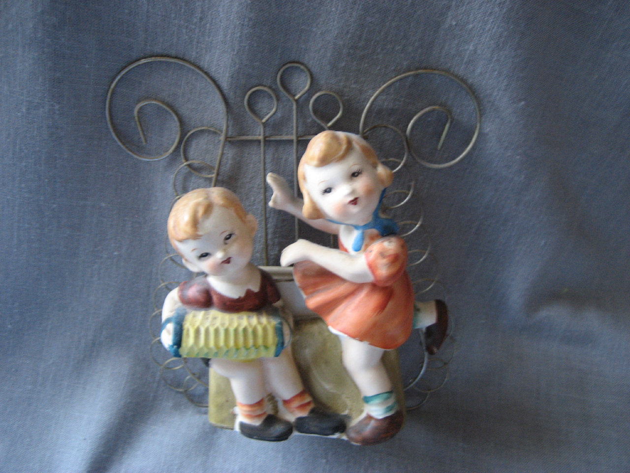 Lipper and Mann Boy and Girl Wall Pocket