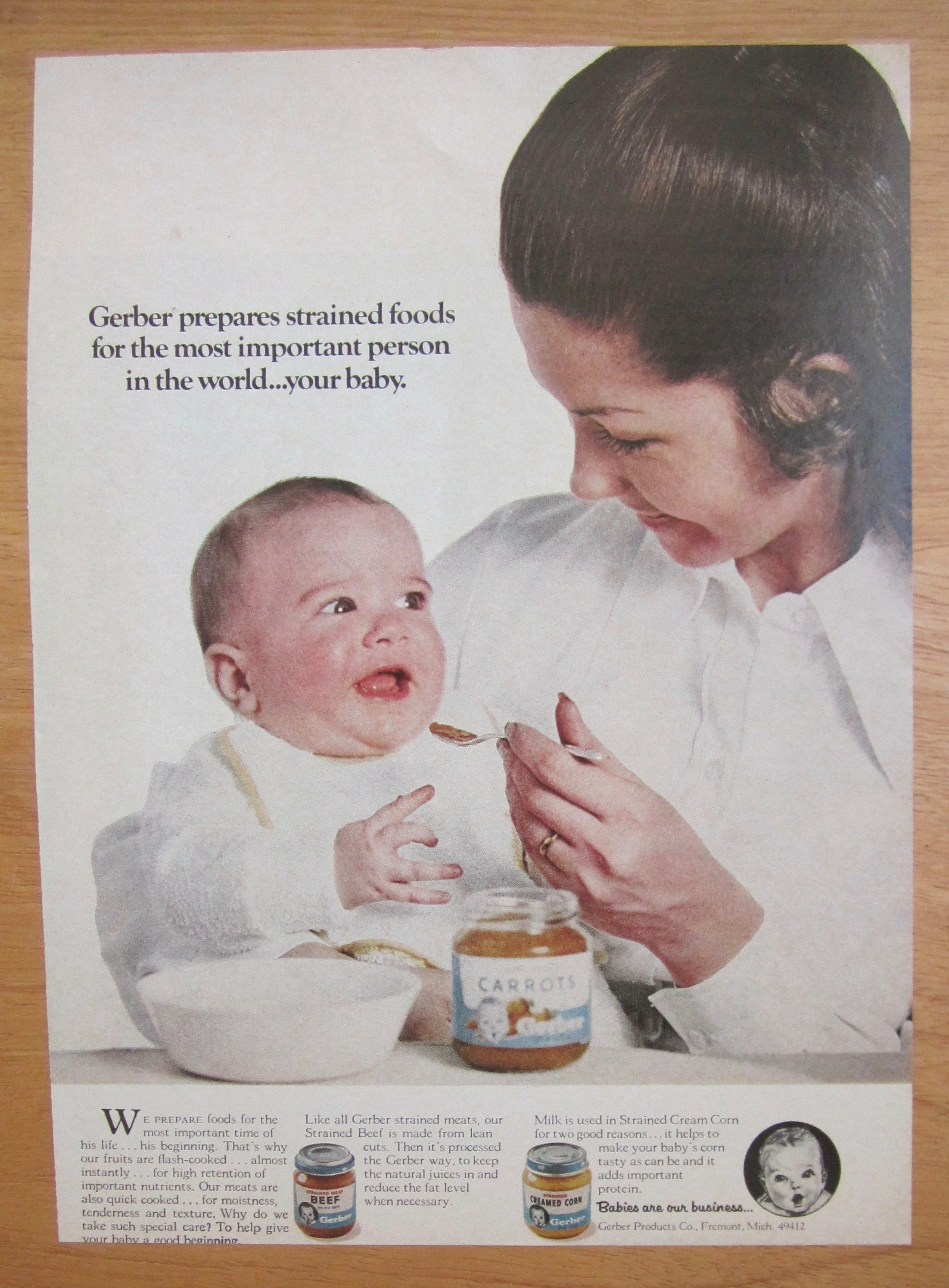 1971 Gerber's Baby Food with Woman Feeding Baby