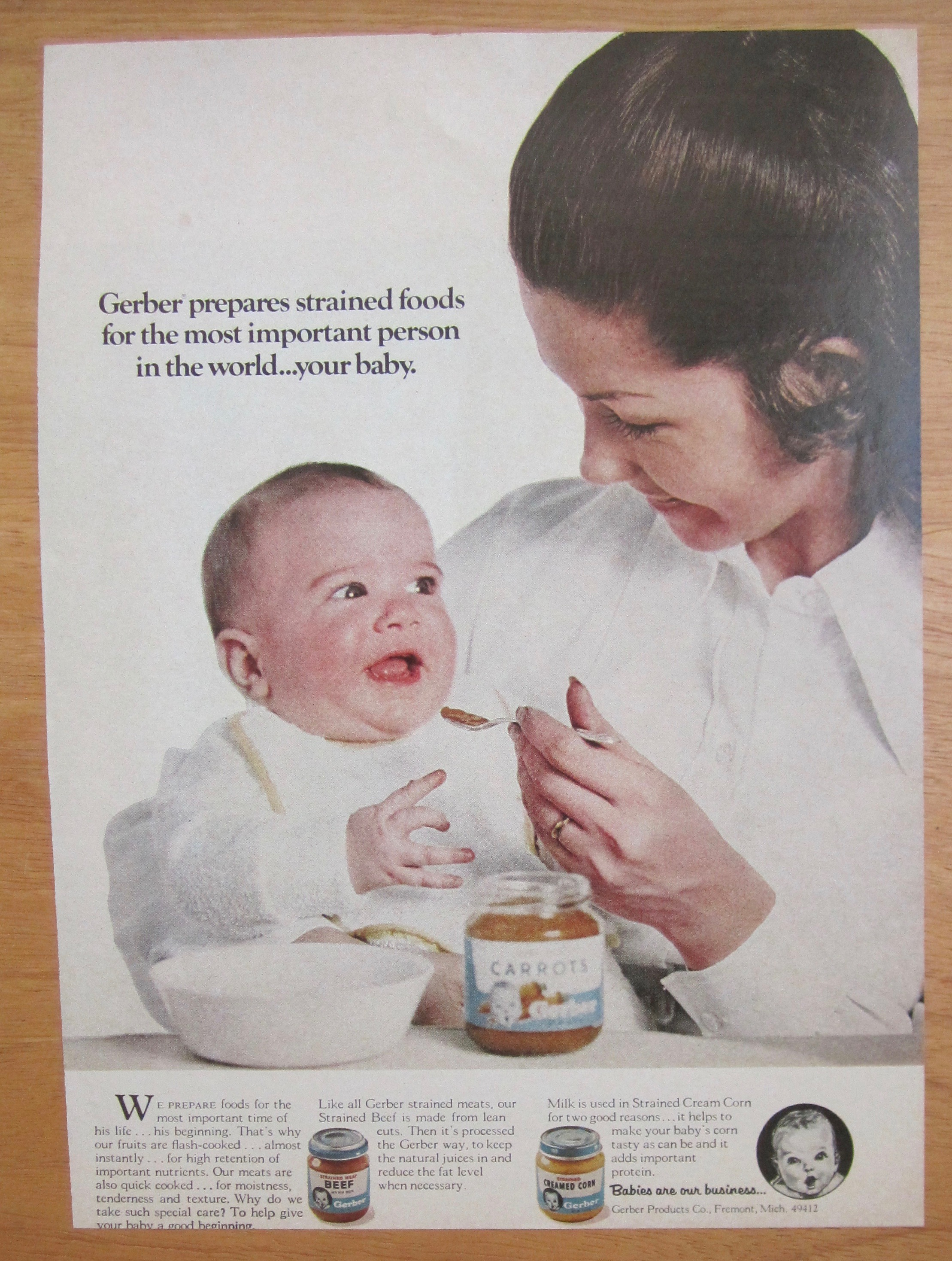 1971 Gerber's Baby Food with Woman Feeding Baby