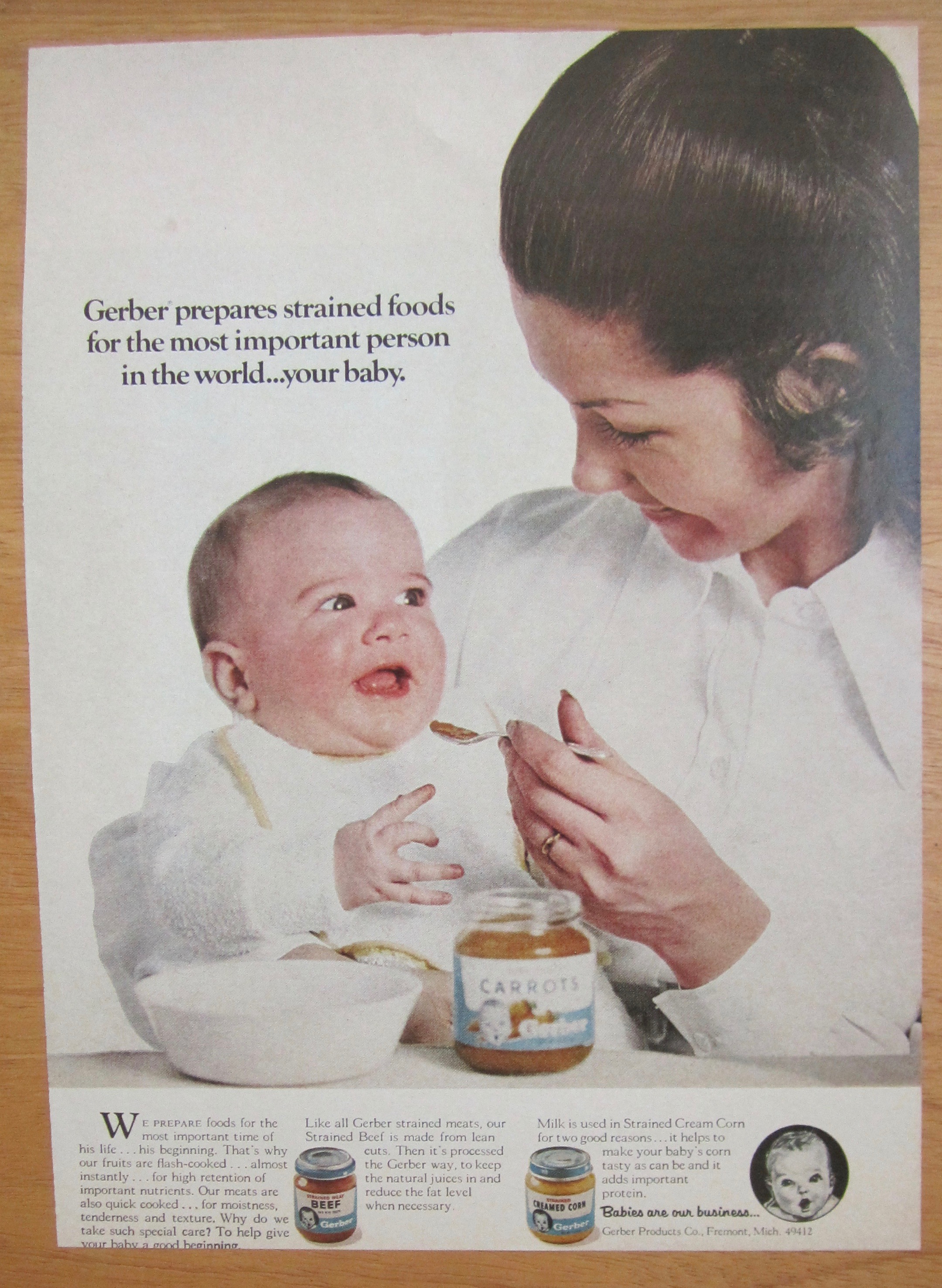 1971 Gerber's Baby Food with Woman Feeding Baby