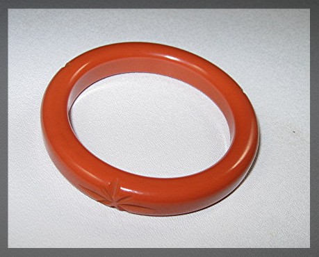 Bakelite Orange Bangle Bracelet Carved Stars