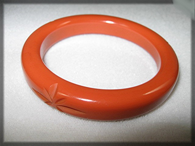 Bakelite Orange Bangle Bracelet Carved Stars