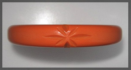 Bakelite Orange Bangle Bracelet Carved Stars