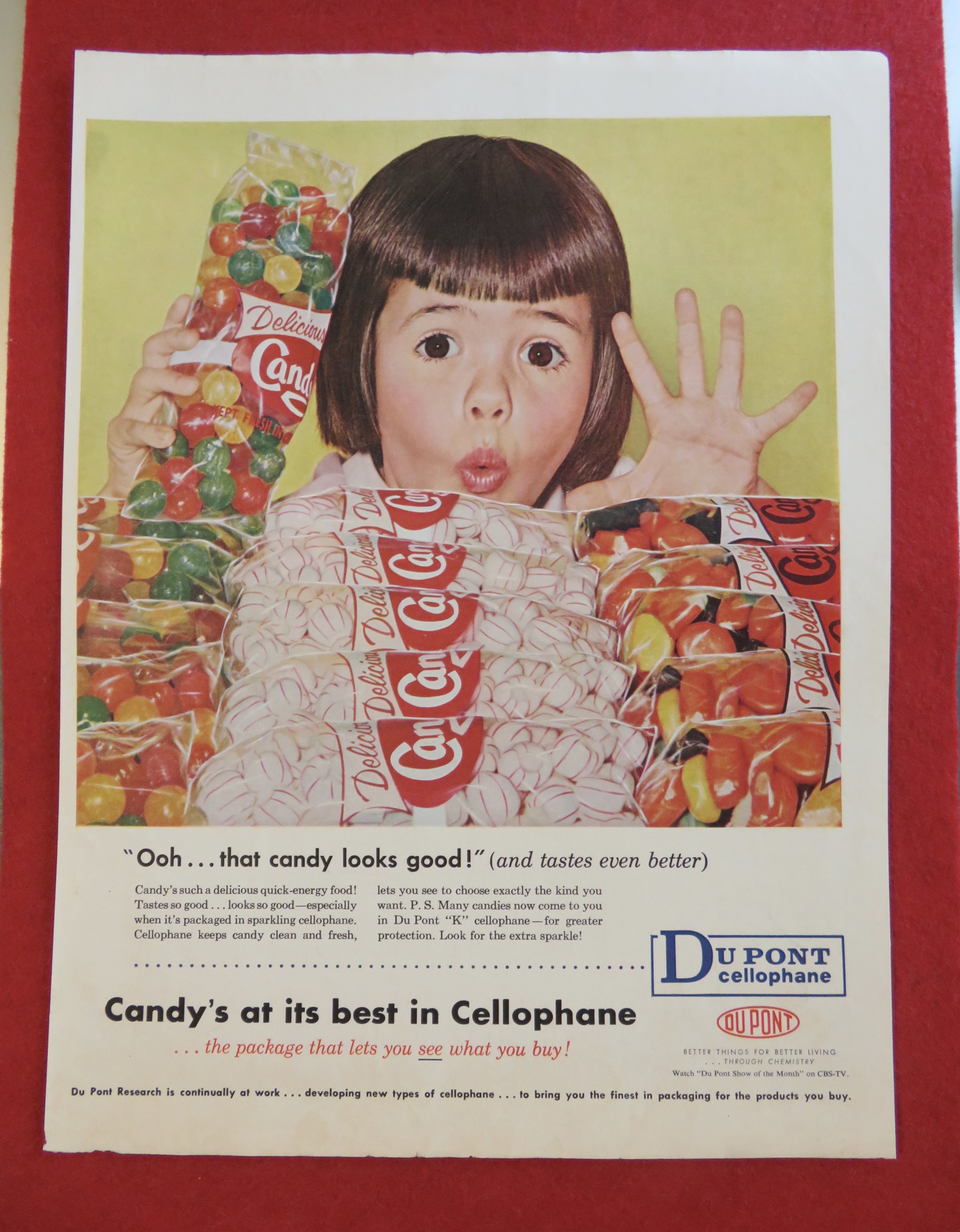 1958 Du Pont Cellophane w/Girl Looking At Bags Of Candy