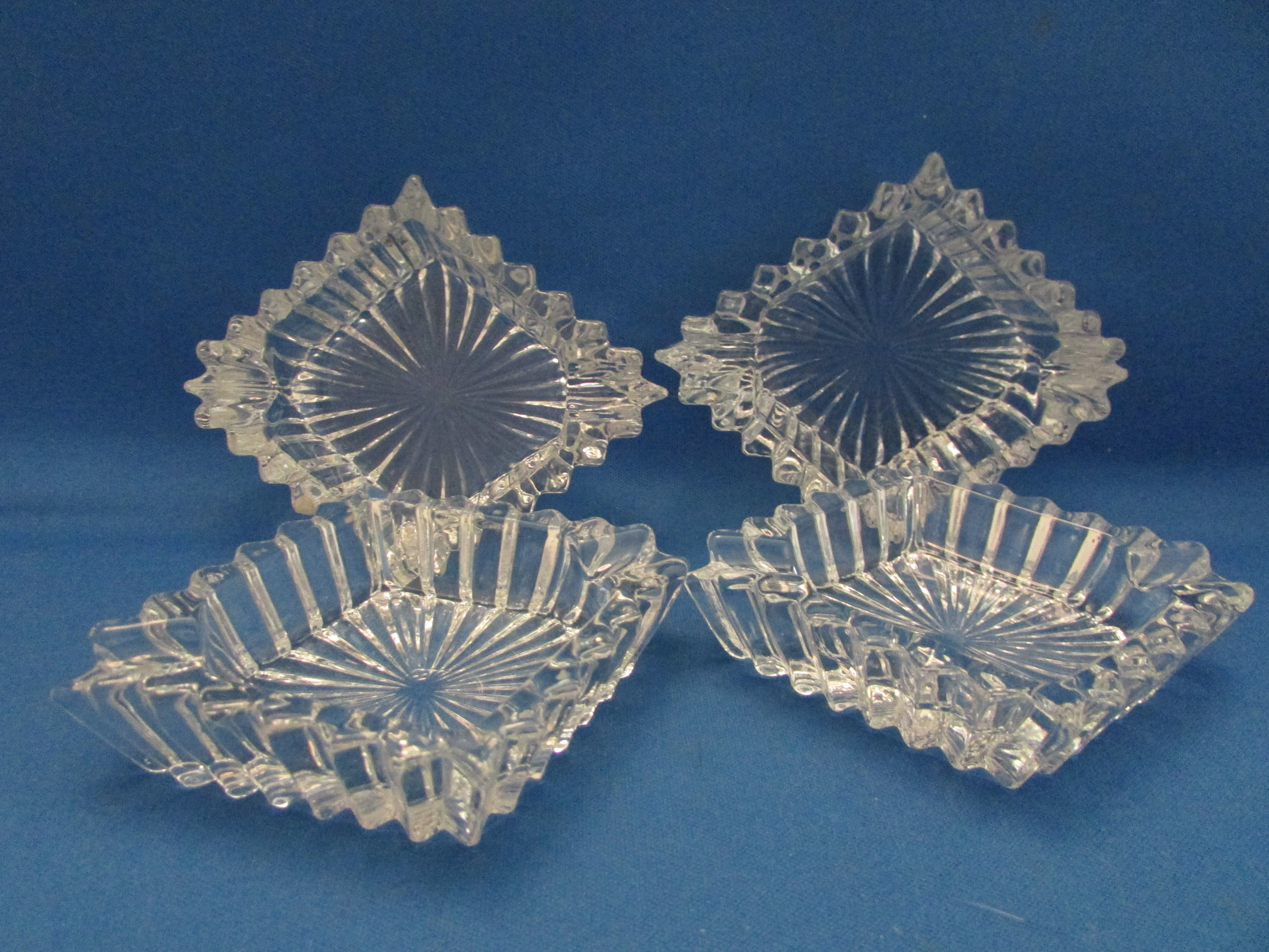 Four Heavy Glass Ash Trays