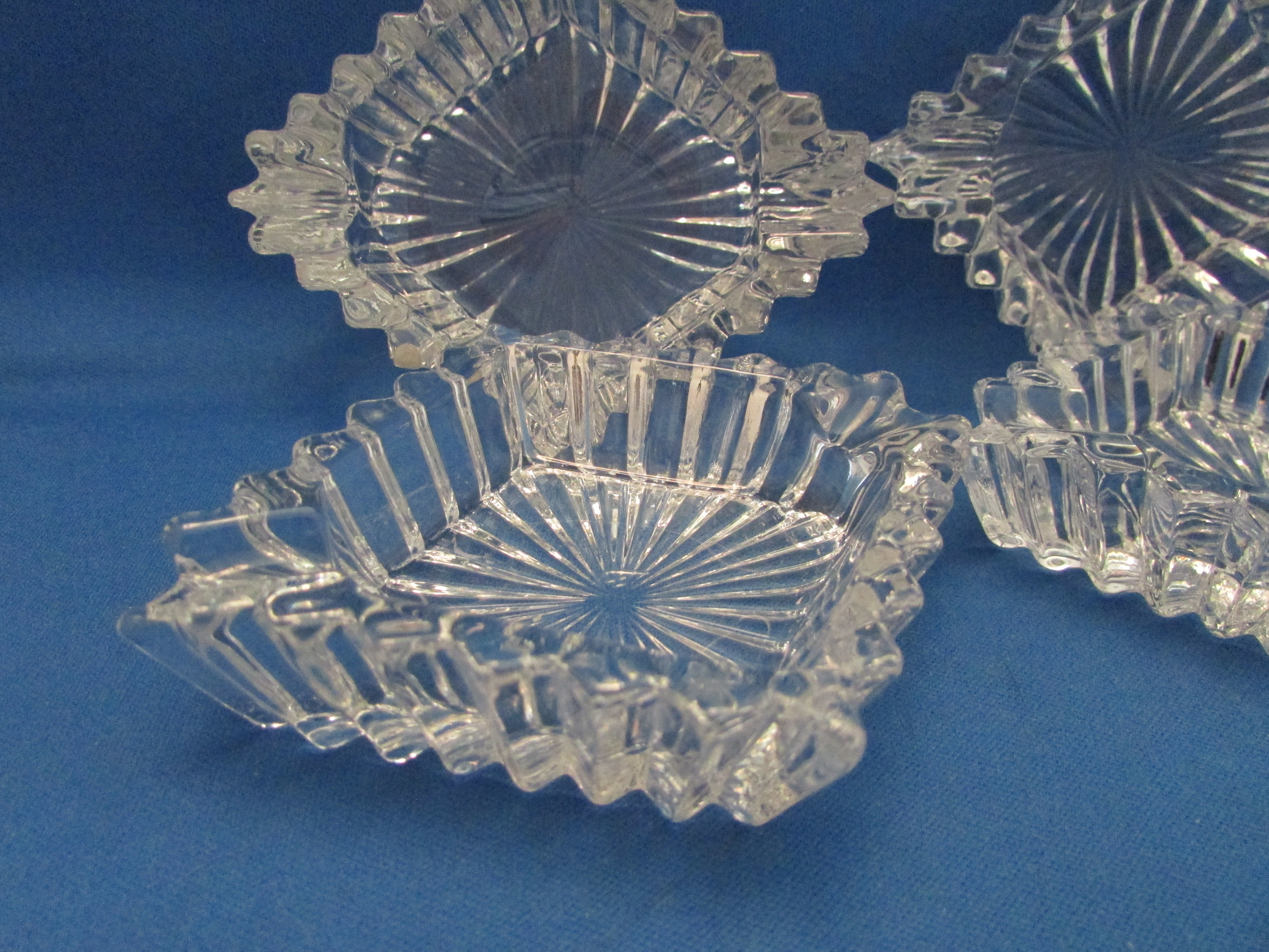 Four Heavy Glass Ash Trays