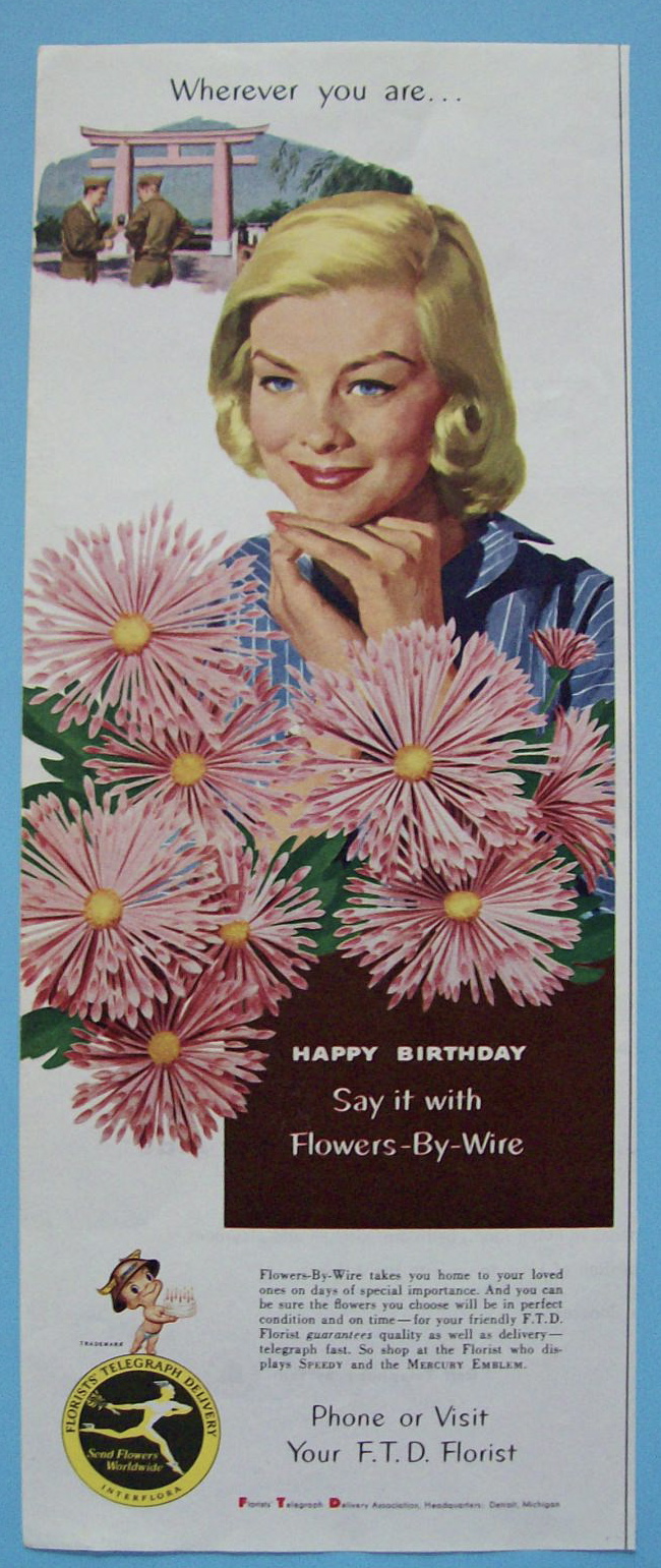 1955 Florists' Telegraph Delivery (FTD) with Woman Smiling
