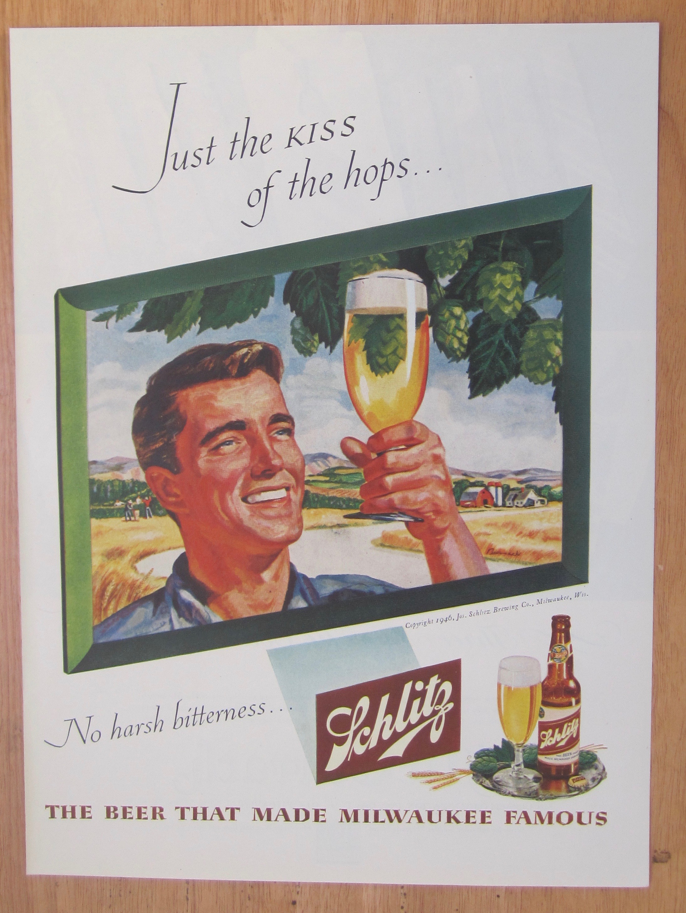 1946 Schlitz Beer with Man Holding Up Glass Of Beer