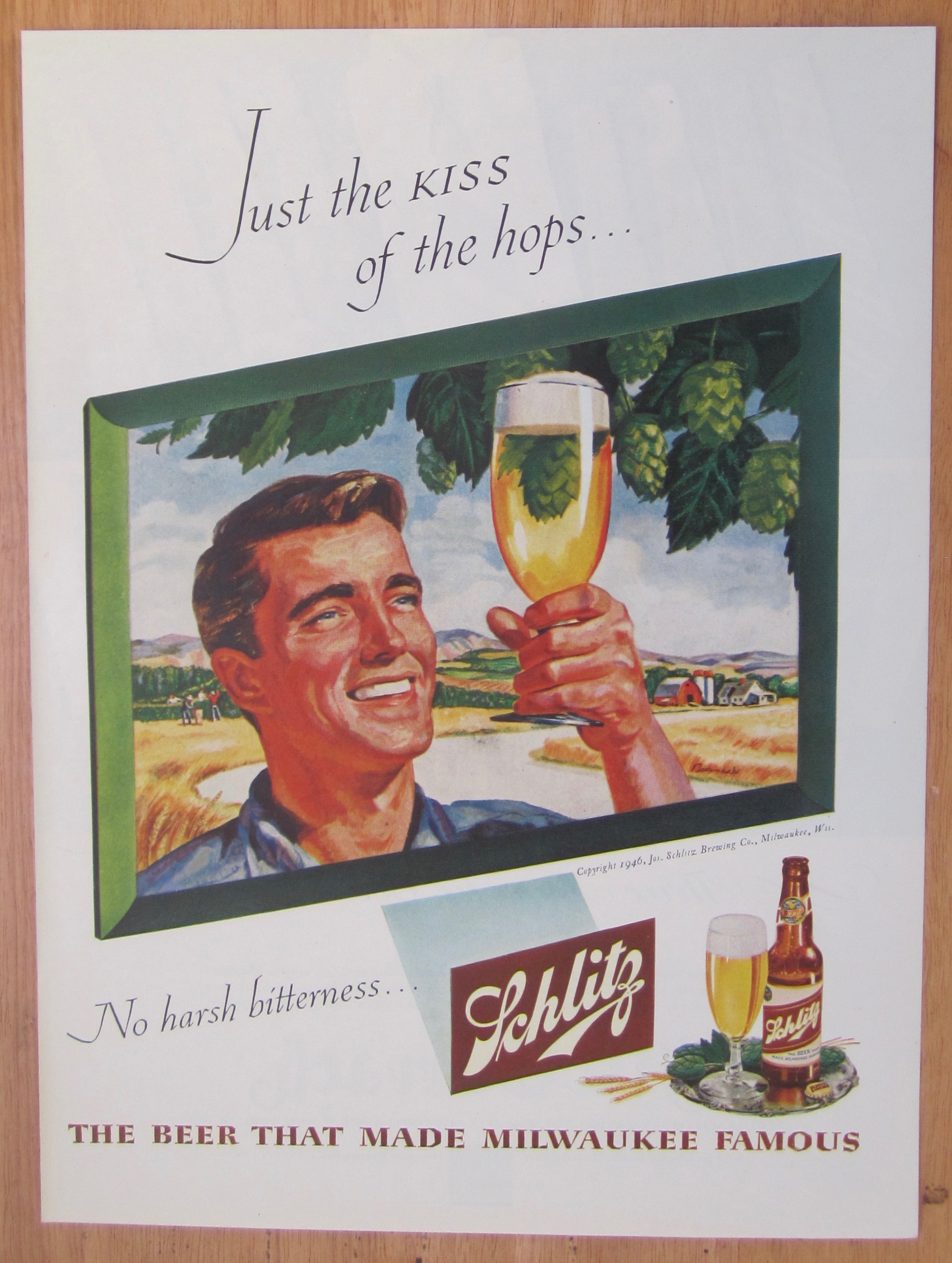 1946 Schlitz Beer with Man Holding Up Glass Of Beer