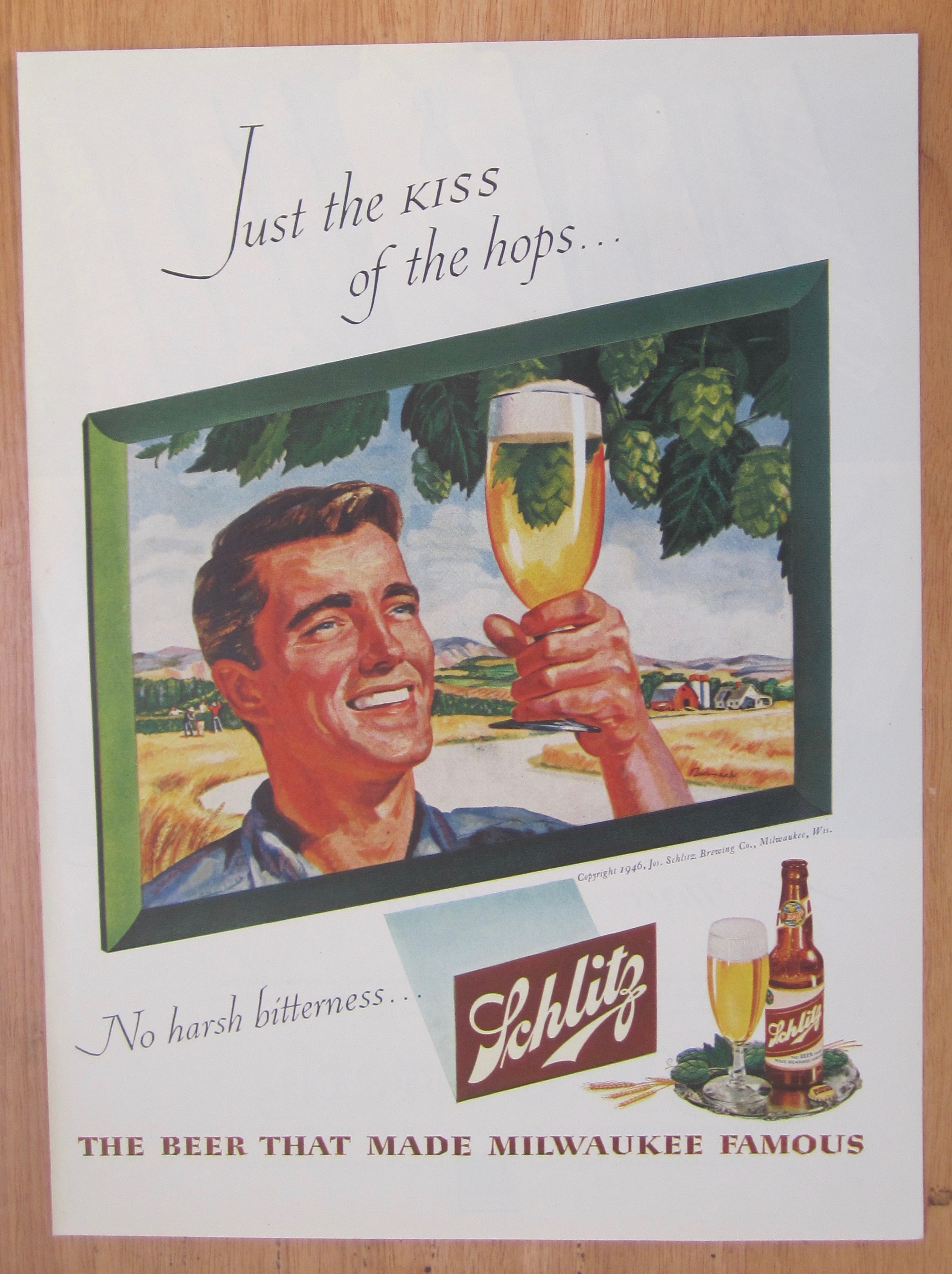 1946 Schlitz Beer with Man Holding Up Glass Of Beer