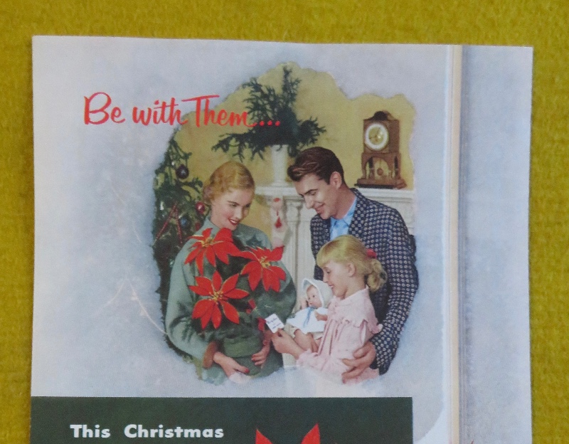 1953 Florists' Telegraph Delivery (FTD) with Woman Holding A Bouquet Of Poinsettias