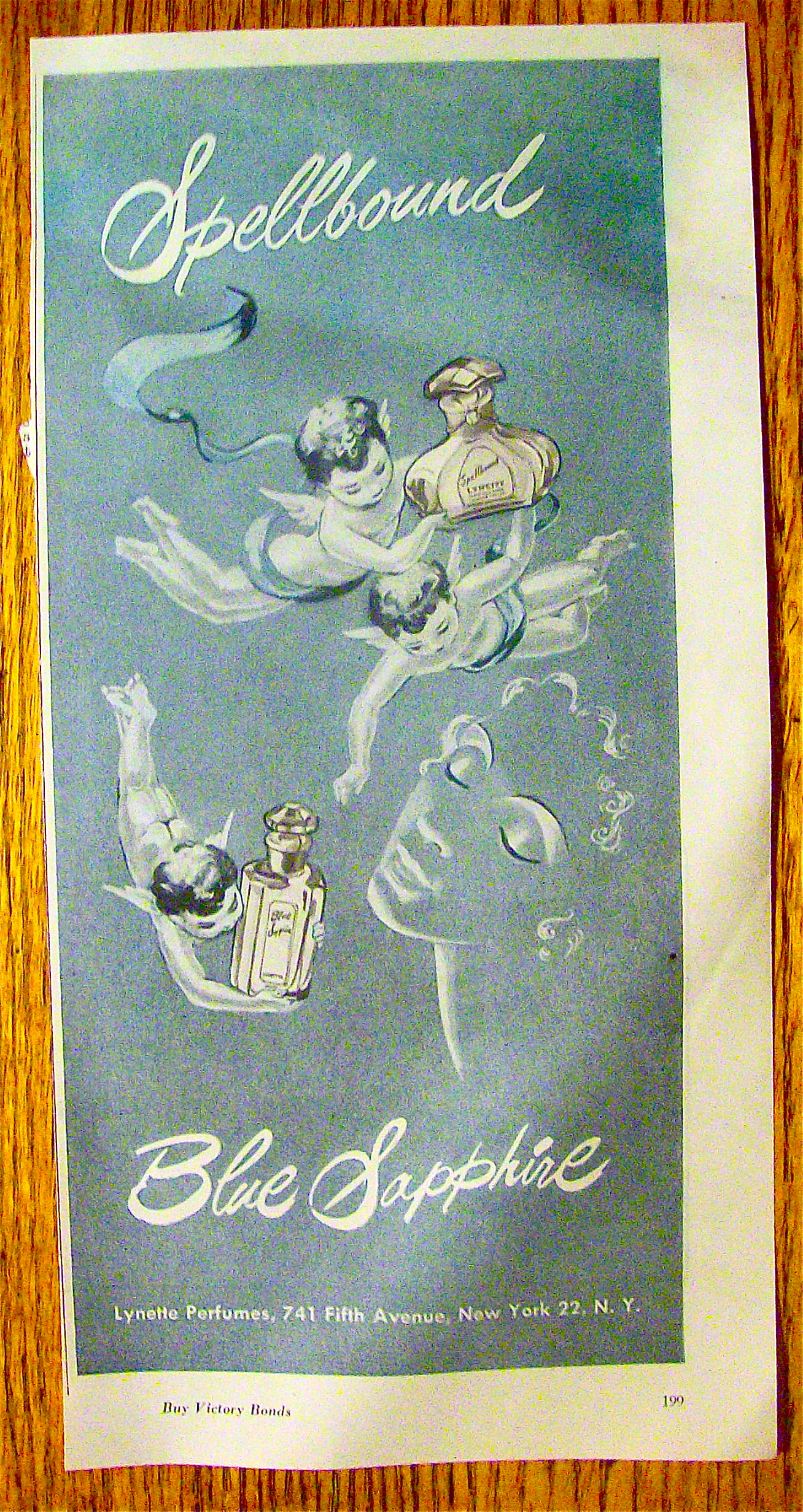 1945 Blue Sapphire Perfume with Cherubs Flying