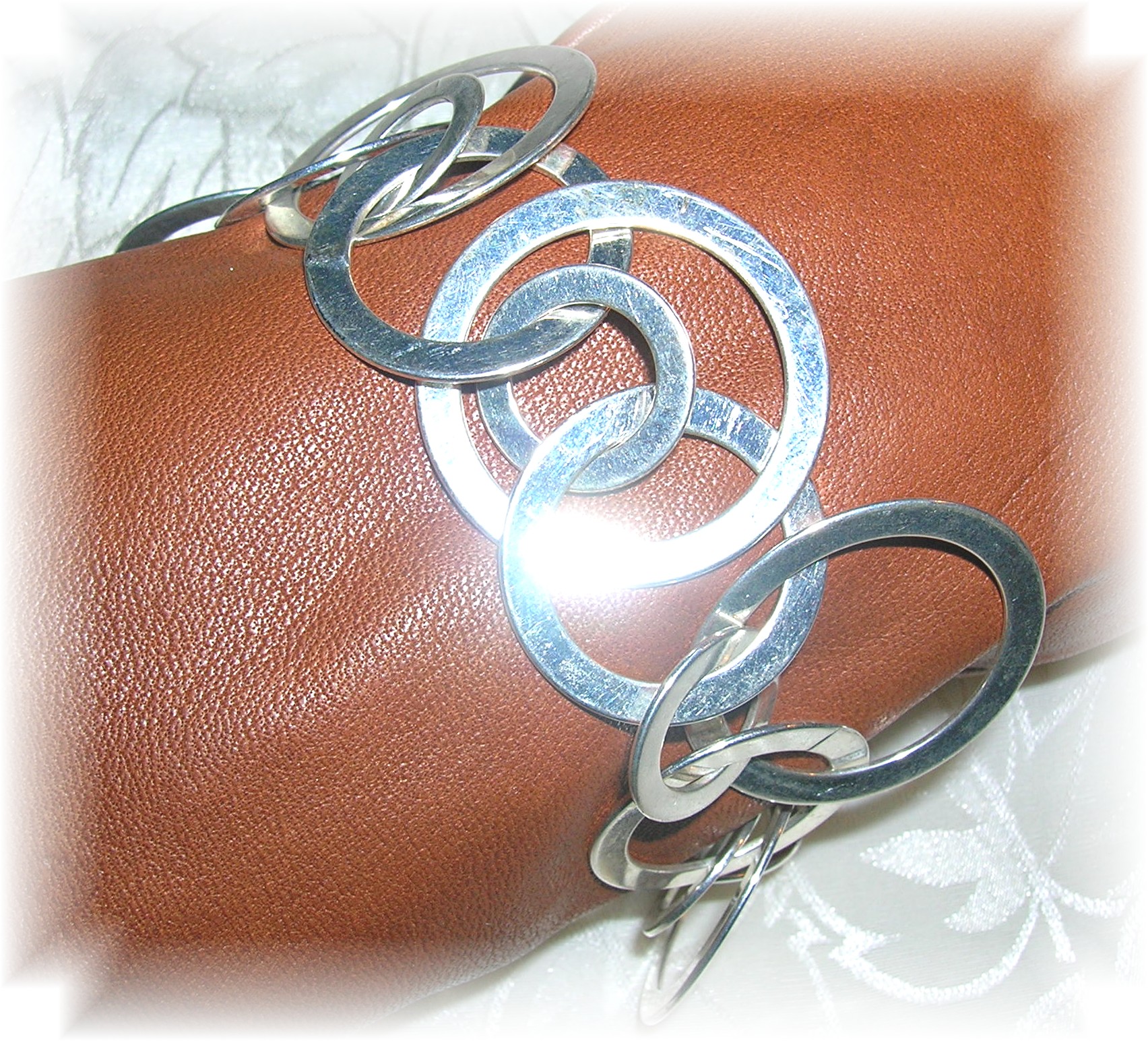 Silvertone Fashion Bracelet - Unique.....