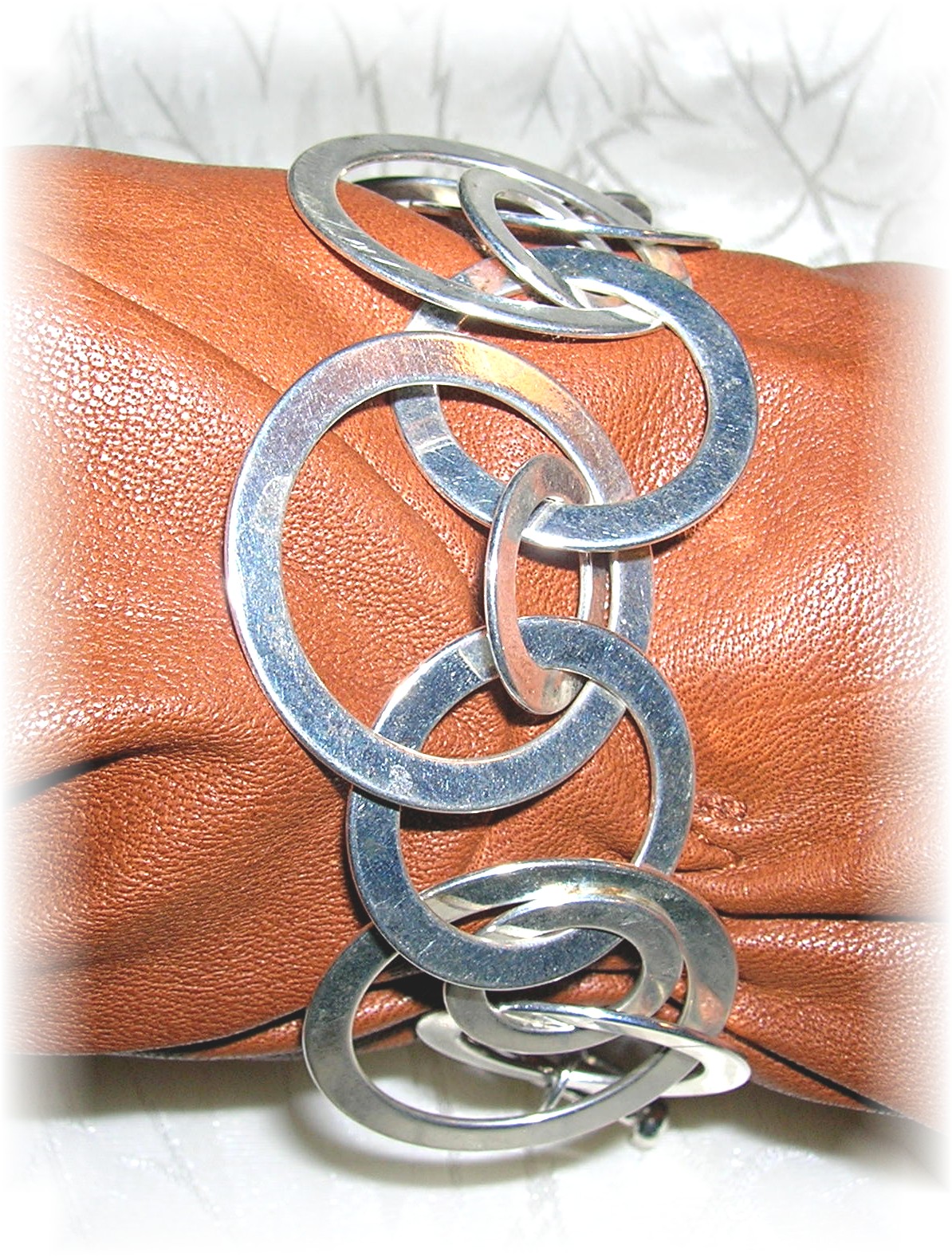 Silvertone Fashion Bracelet - Unique.....