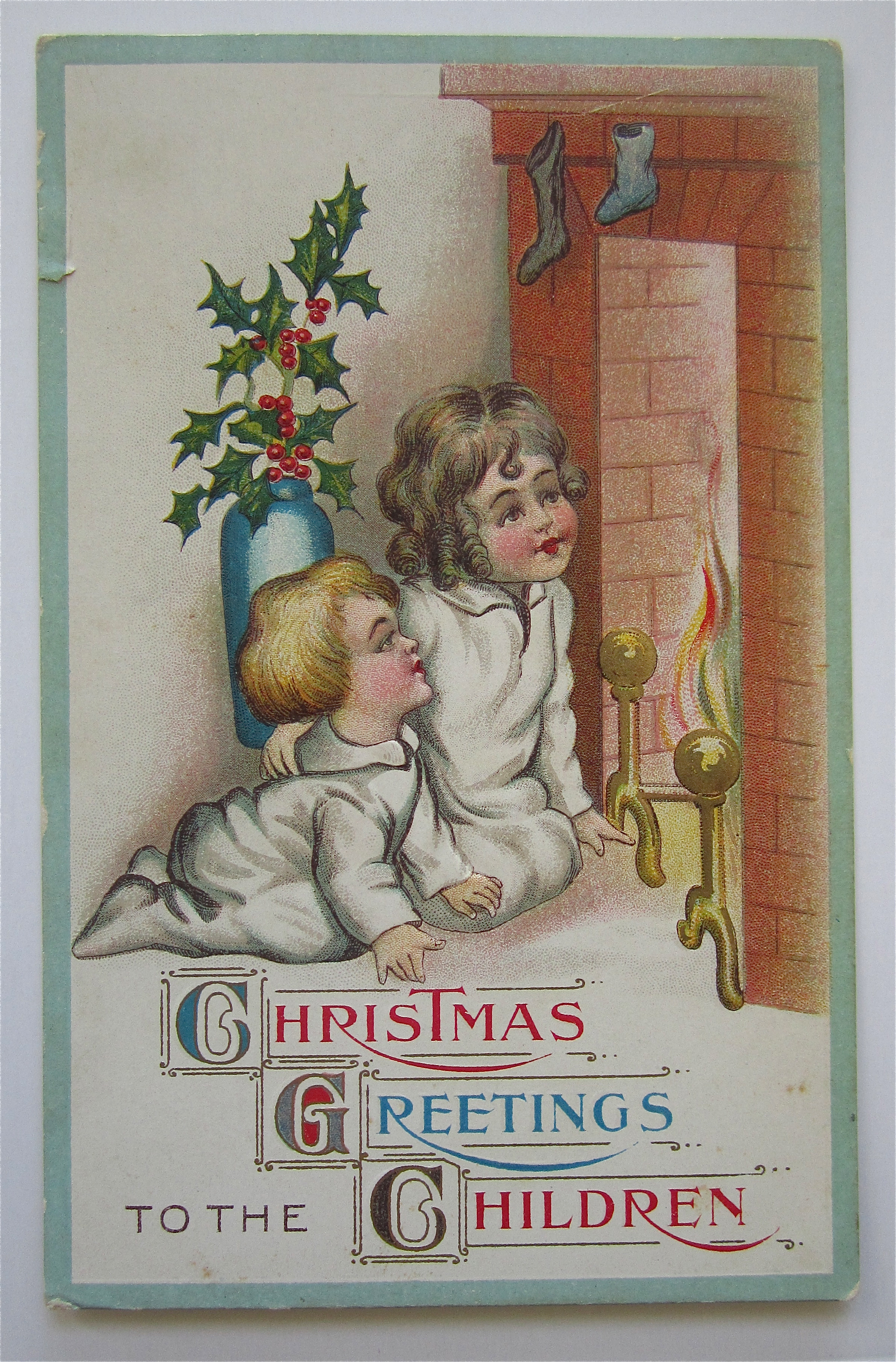 Girl And Boy Waiting For Santa To Come Down Chimney