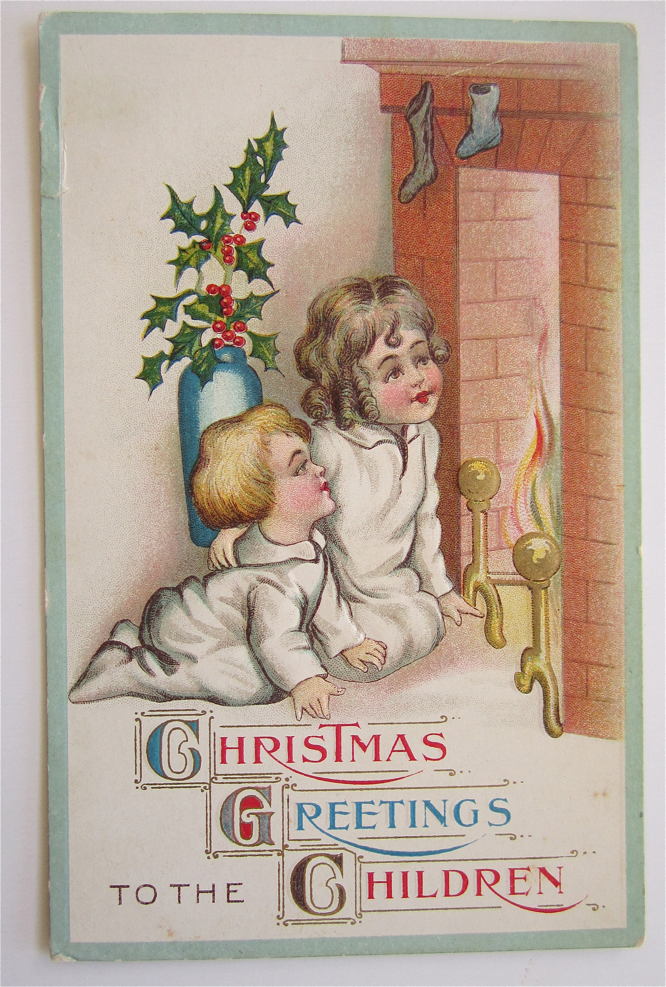 Girl And Boy Waiting For Santa To Come Down Chimney