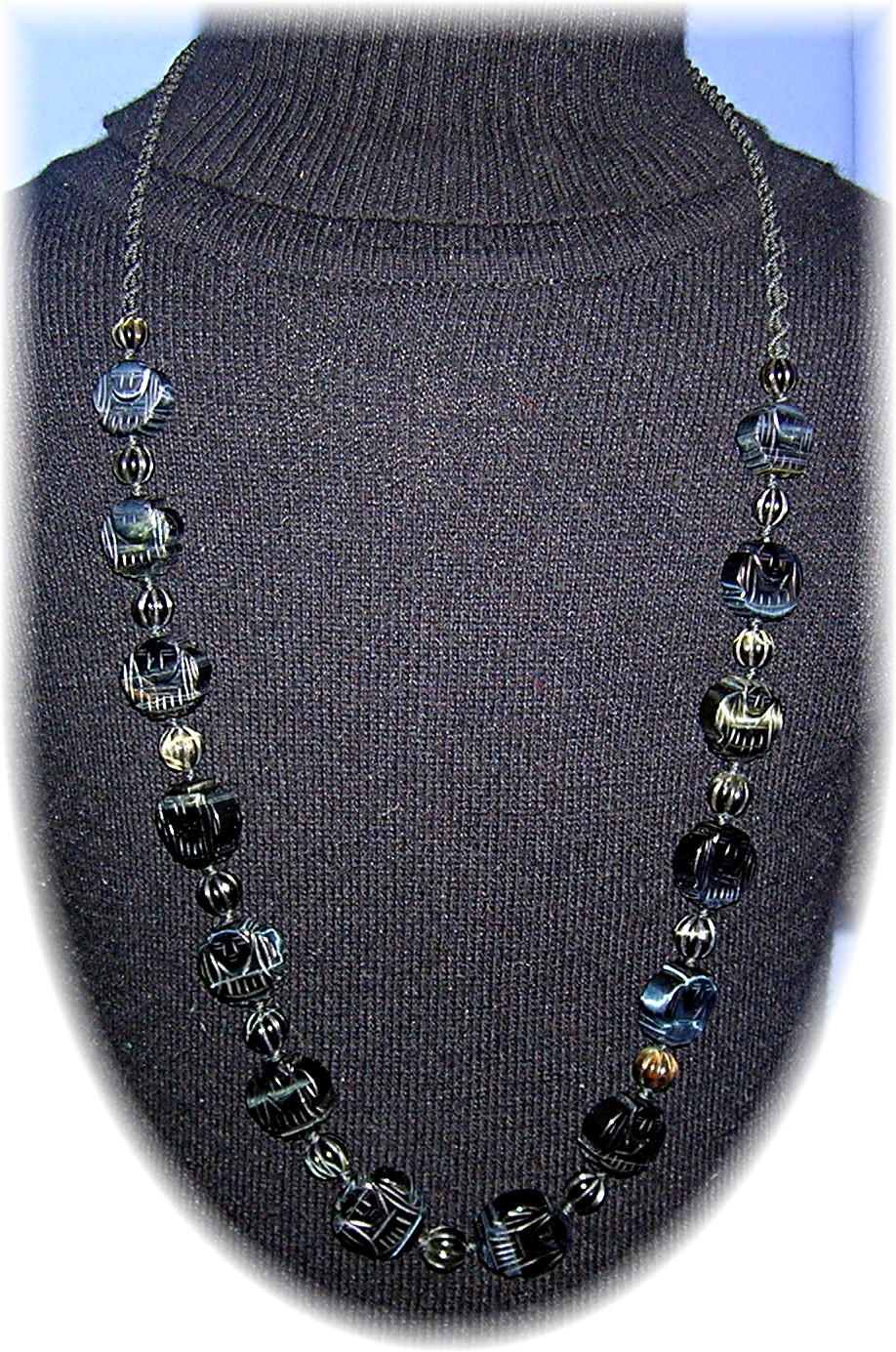 Carved Obsidian Faces 26 Inch Necklace