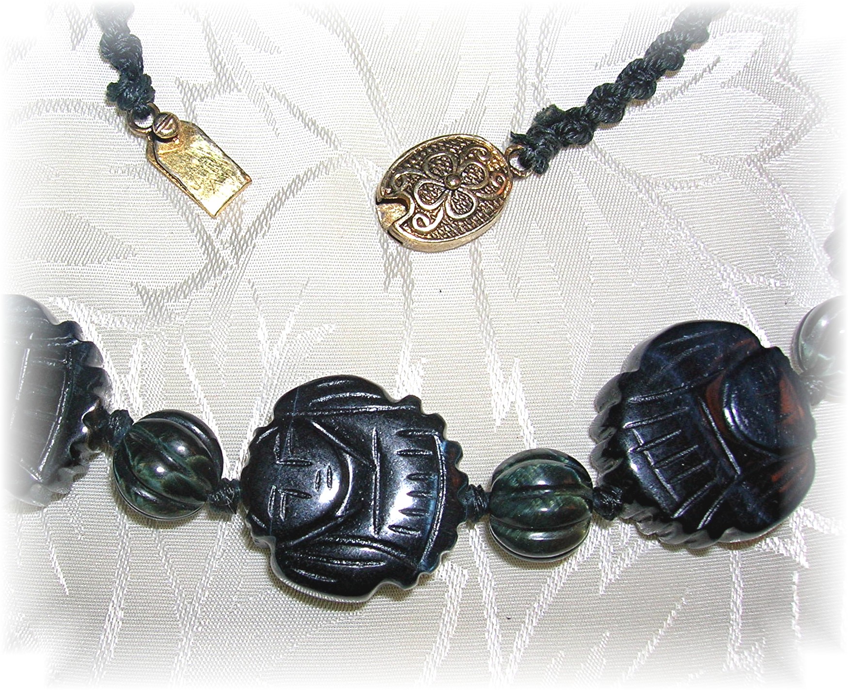 Carved Obsidian Faces 26 Inch Necklace