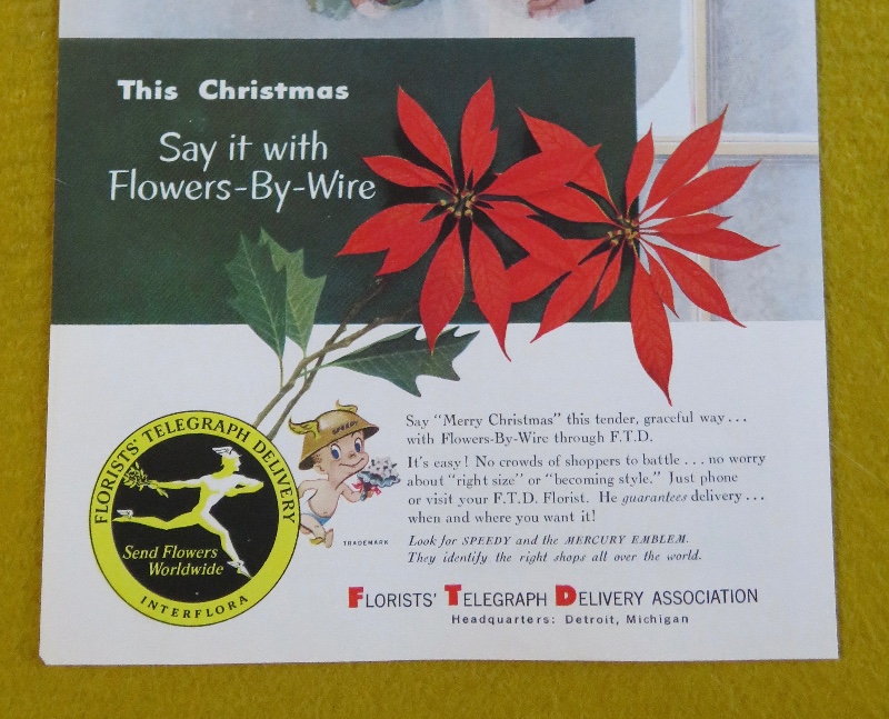 1953 Florists' Telegraph Delivery (FTD) with Woman Holding A Bouquet Of Poinsettias