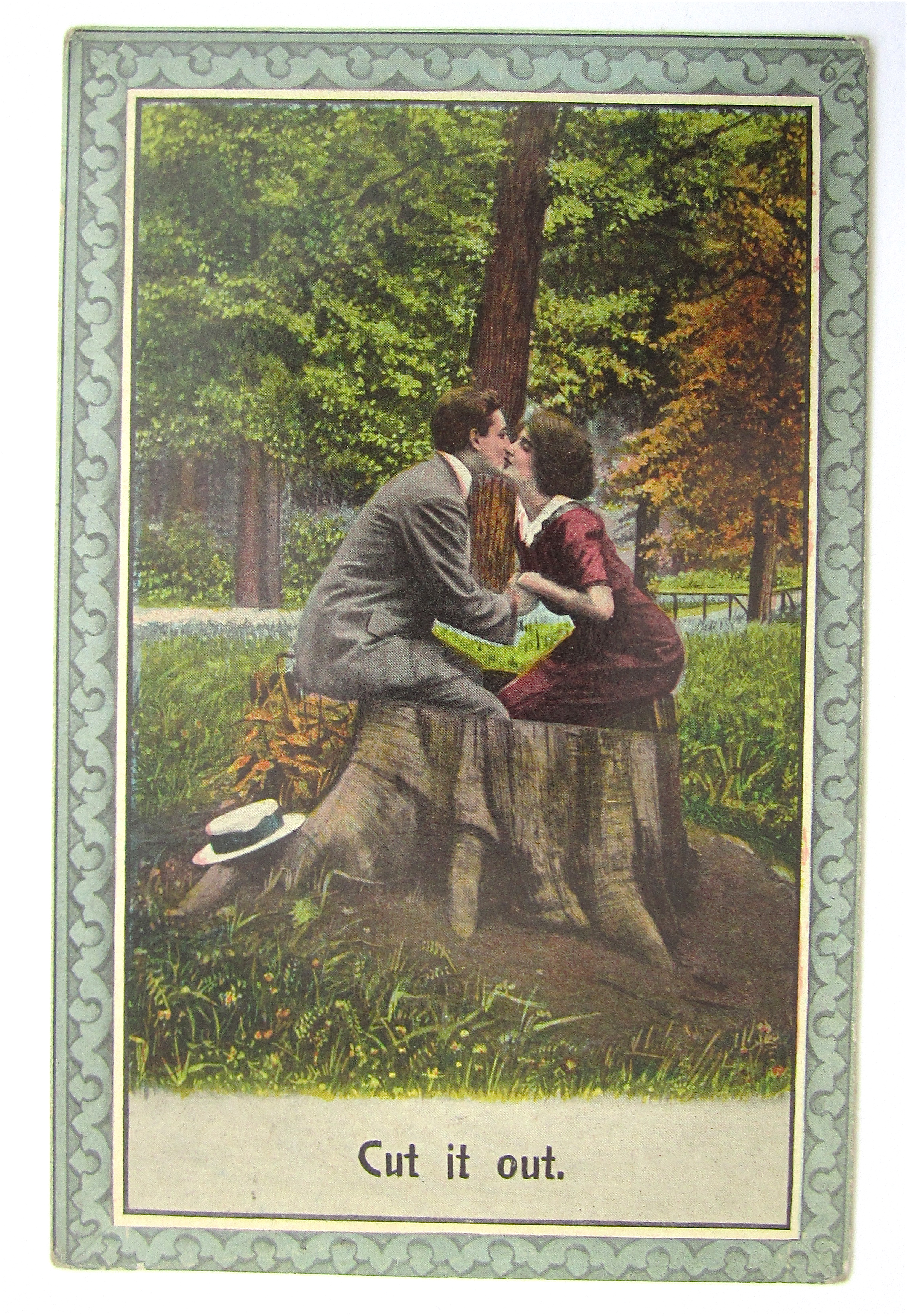 Man And Woman Kissing On Tree Trunk Postcard