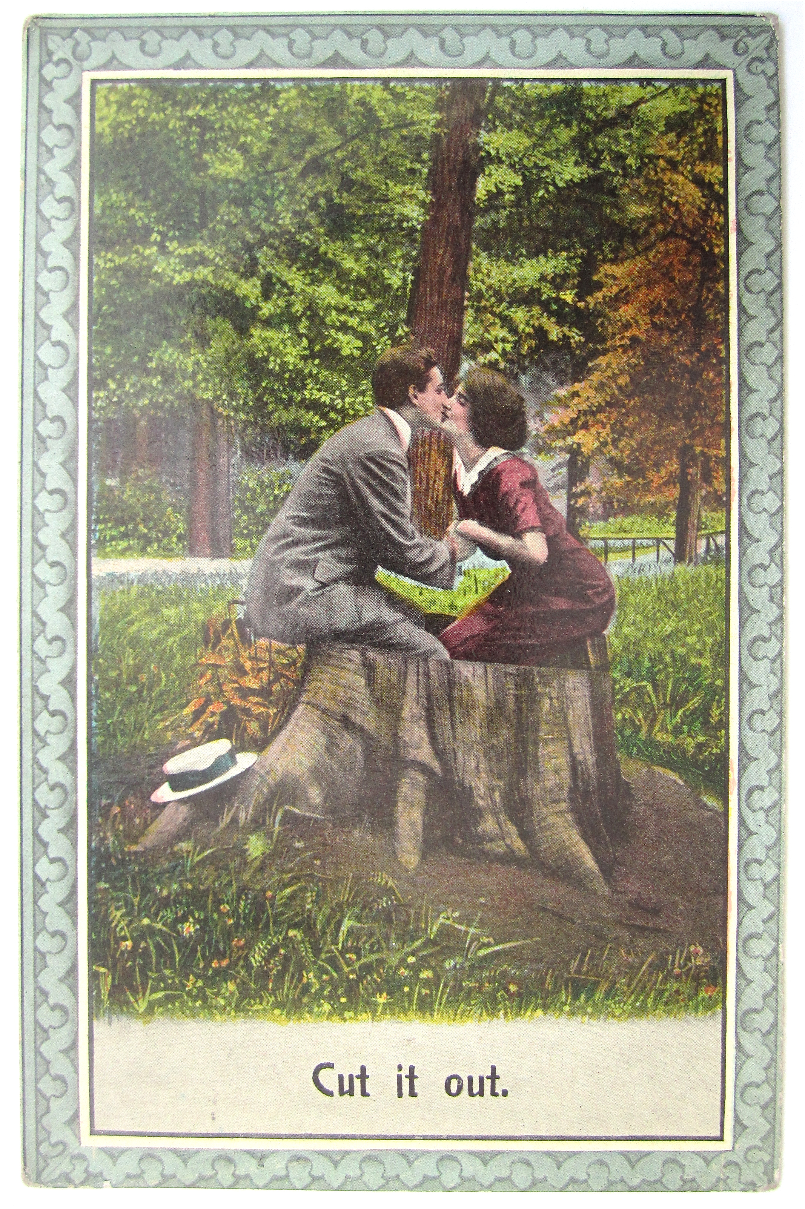 Man And Woman Kissing On Tree Trunk Postcard