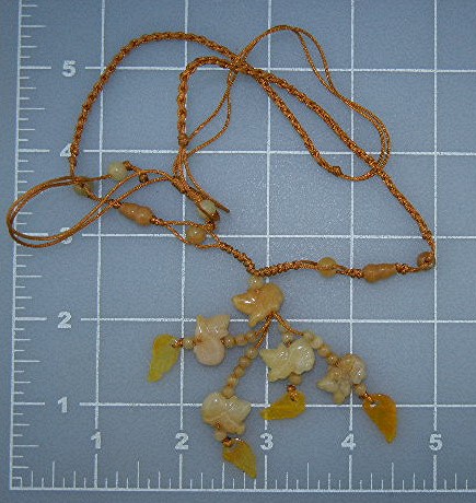 Jade Animals Gold Silk Necklace