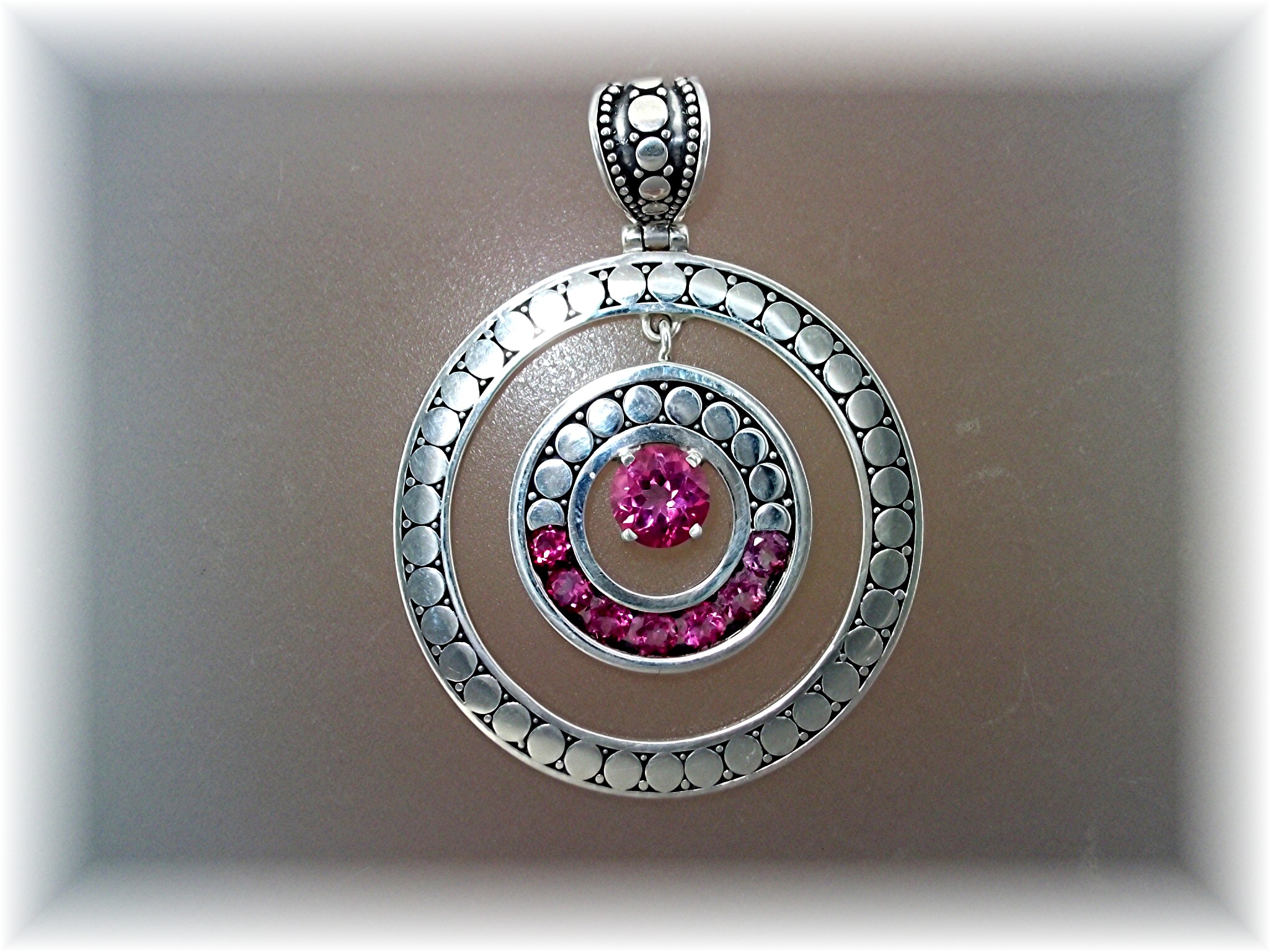 Pink Topaz Sterling Silver Circle Pendant By Peggy V