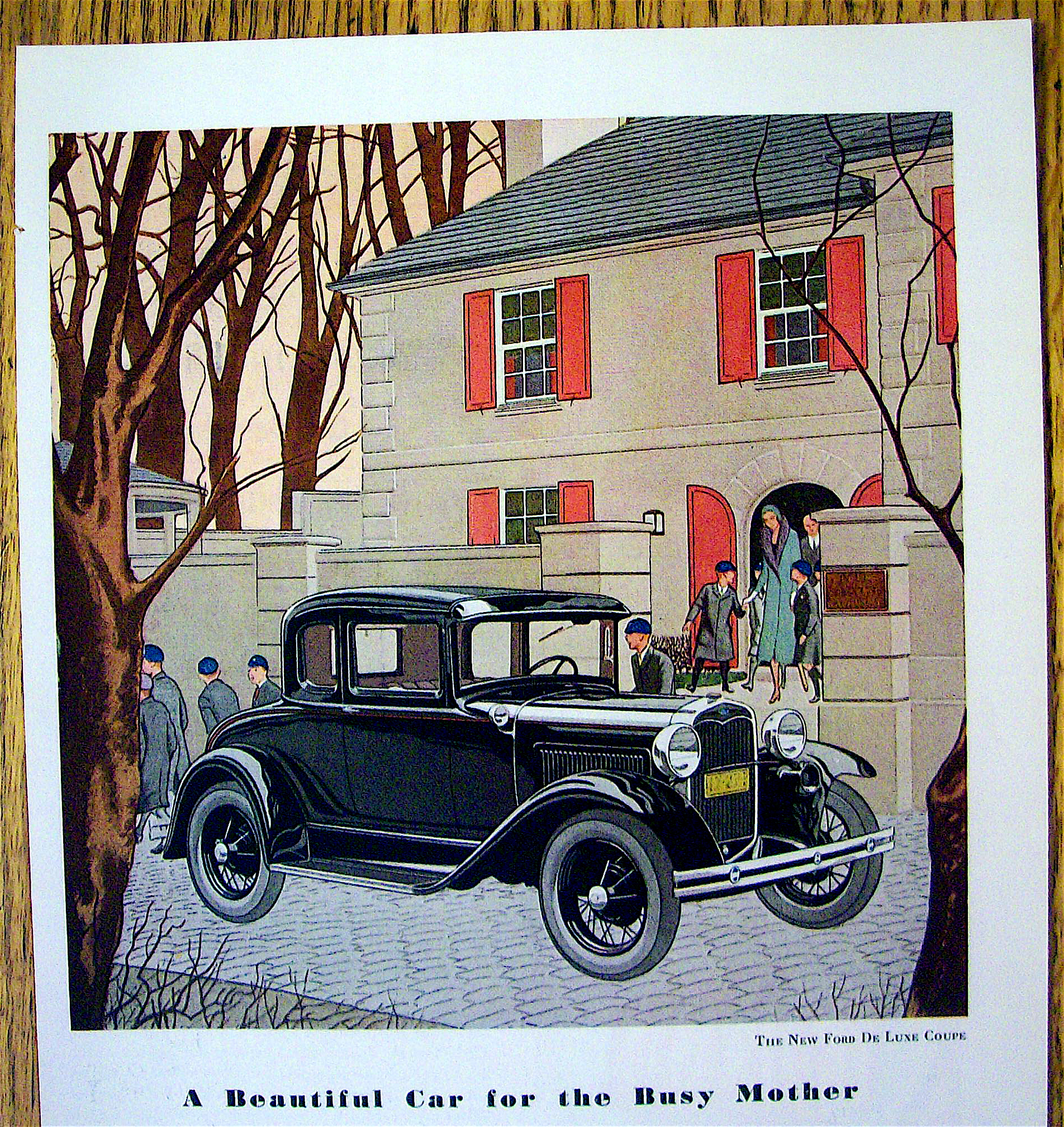 1931 Ford with the New Ford De Luxe Coupe