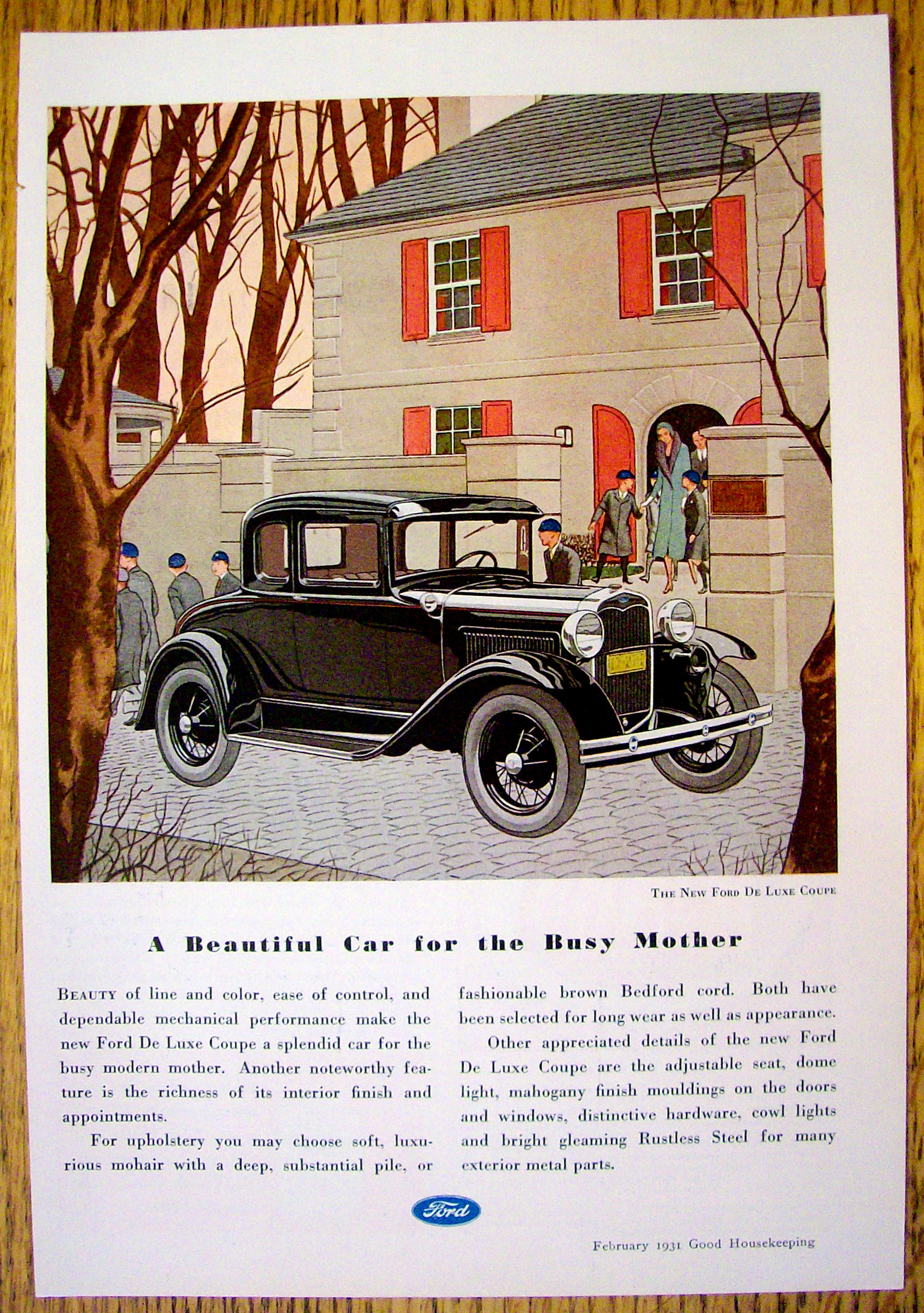 1931 Ford with the New Ford De Luxe Coupe