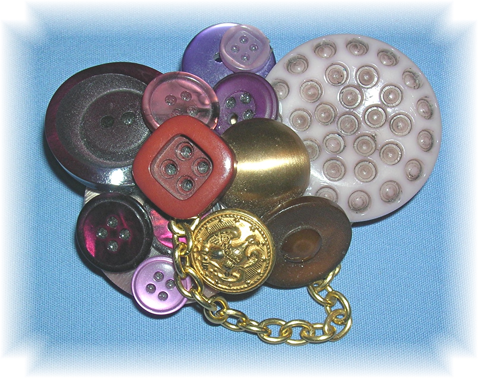 Button Collage Brooch In Purples And Gold