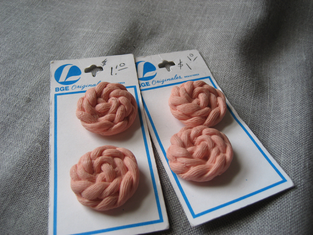 Four Pink Plastic Button