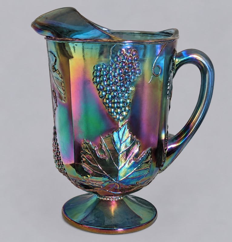 Carnival glass iced tea set pitcher left
