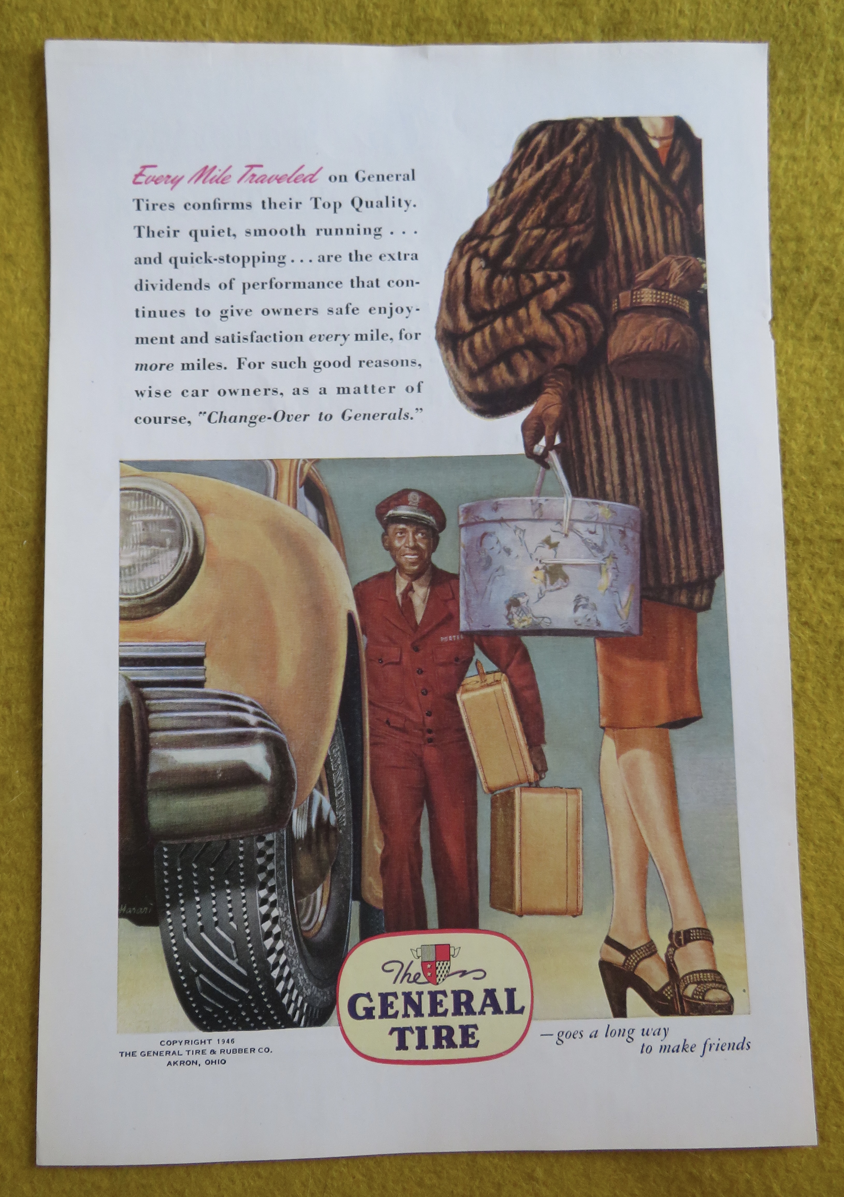 1946 General Tire with Woman Walking & Man with Bags
