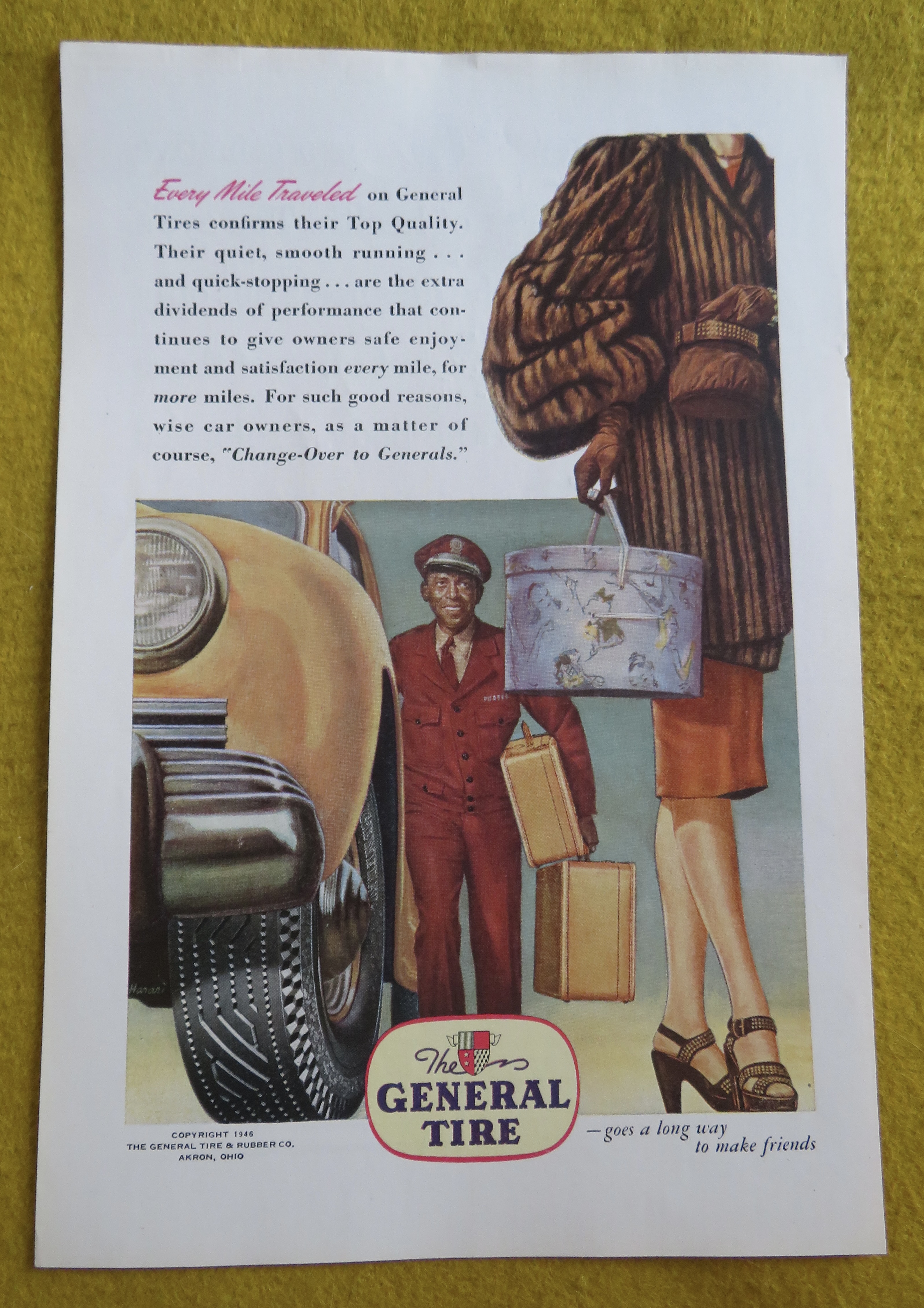 1946 General Tire with Woman Walking & Man with Bags