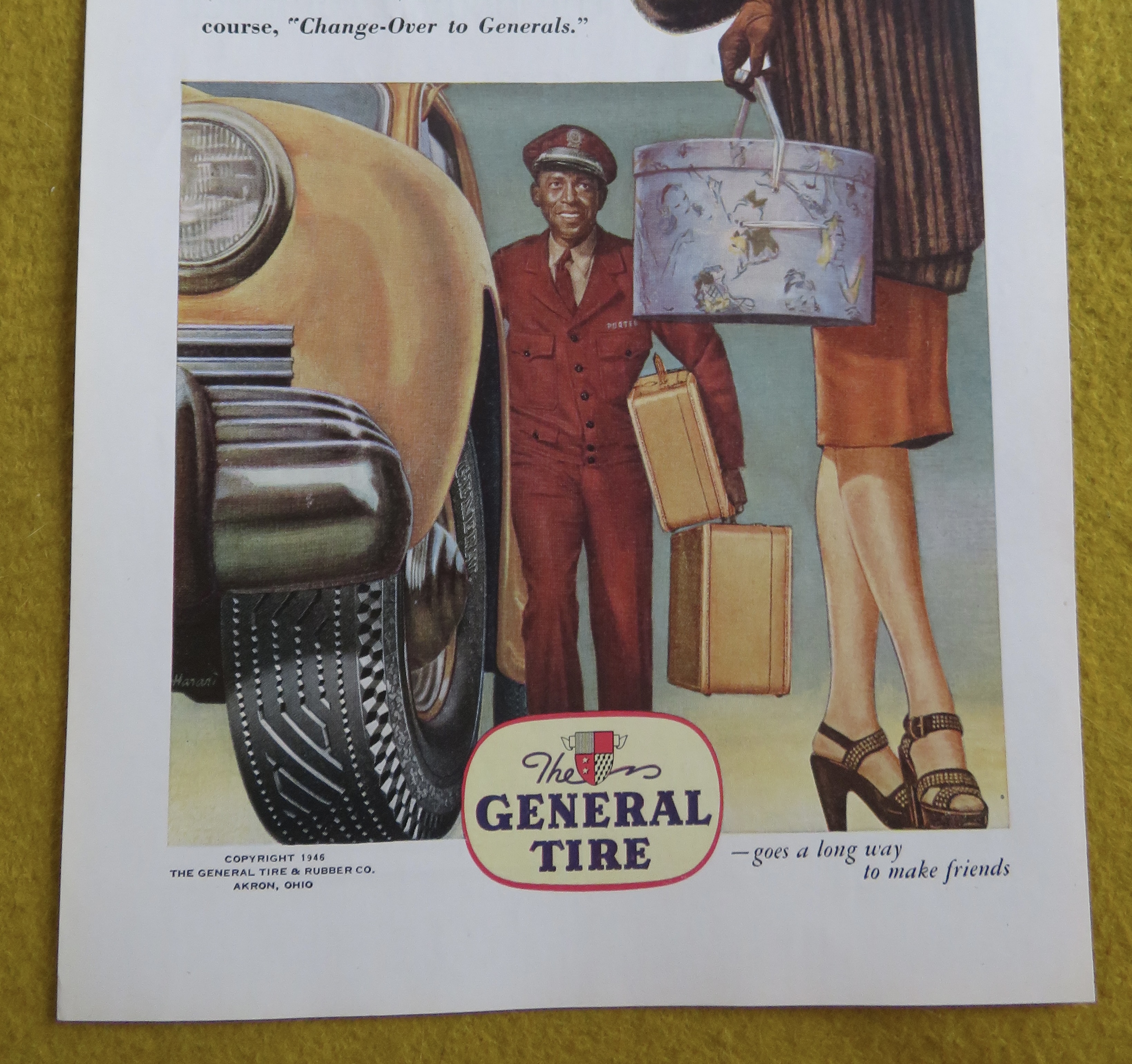 1946 General Tire with Woman Walking & Man with Bags