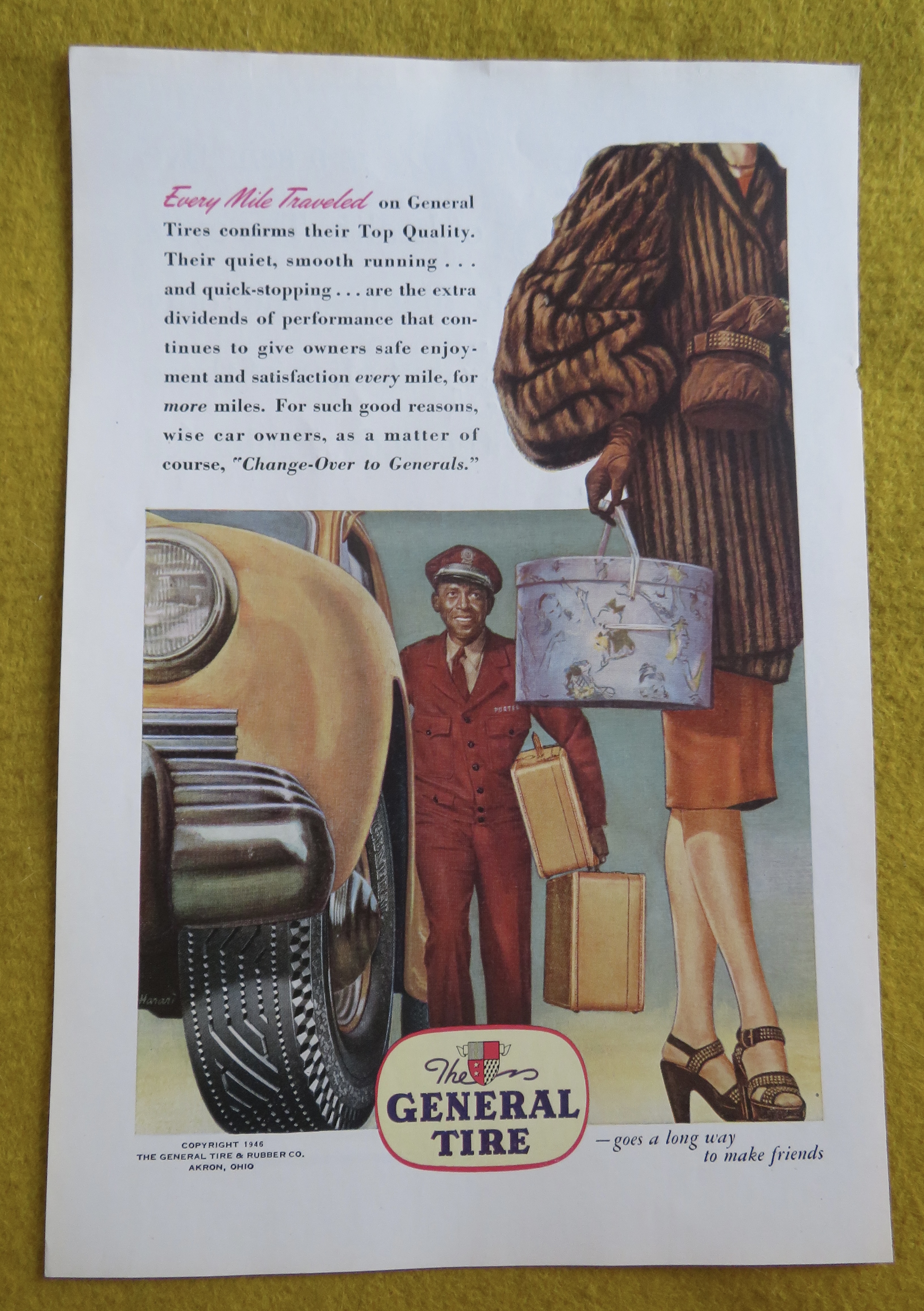 1946 General Tire with Woman Walking & Man with Bags