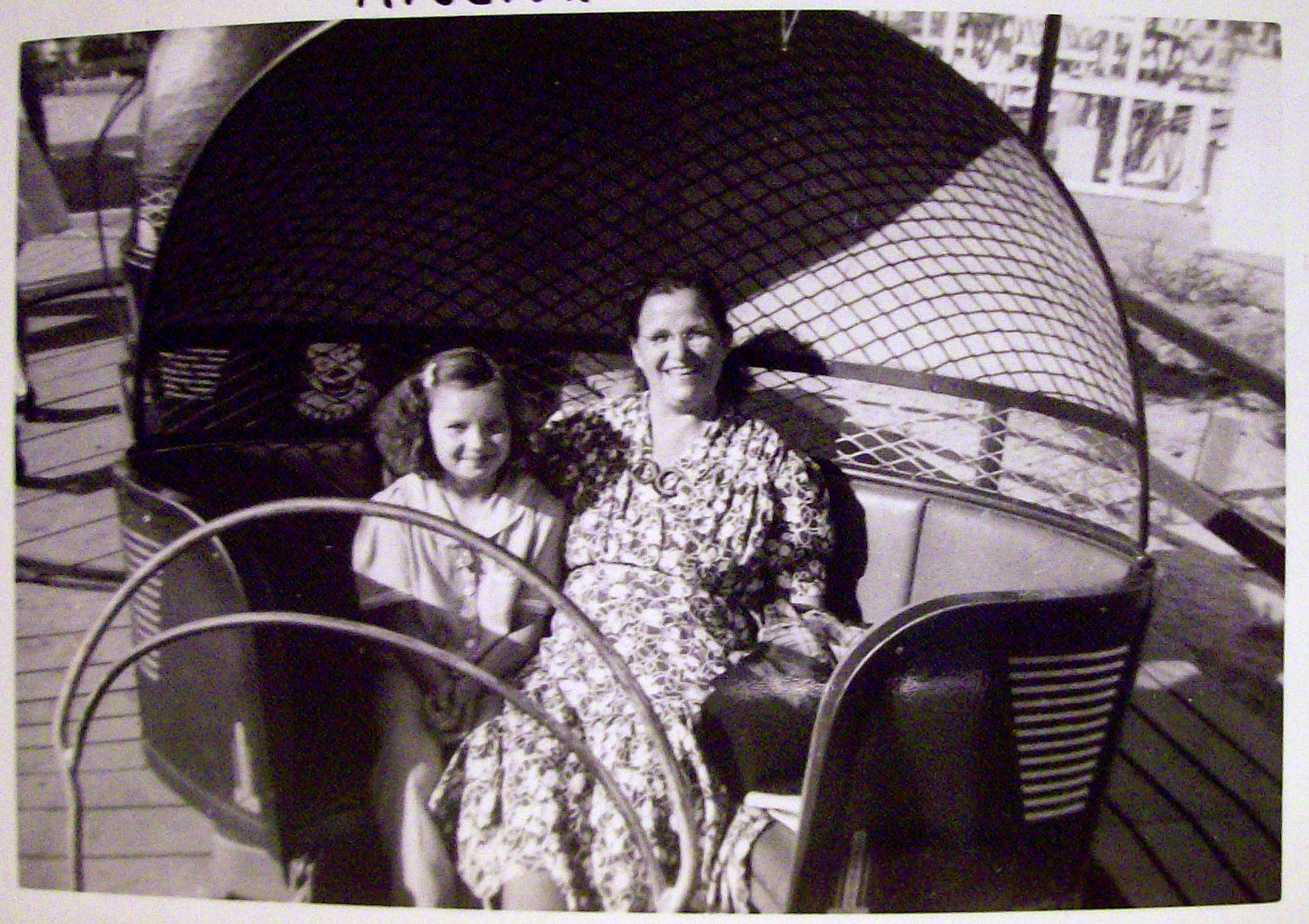 Photograph Of Woman & Girl On A Tilt A Whirl