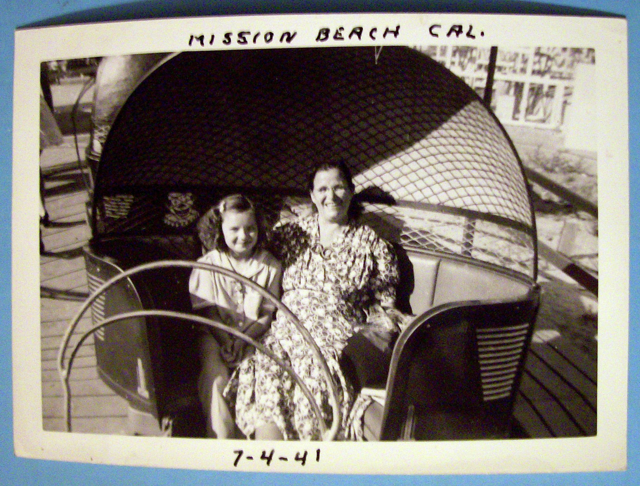 Photograph Of Woman & Girl On A Tilt A Whirl