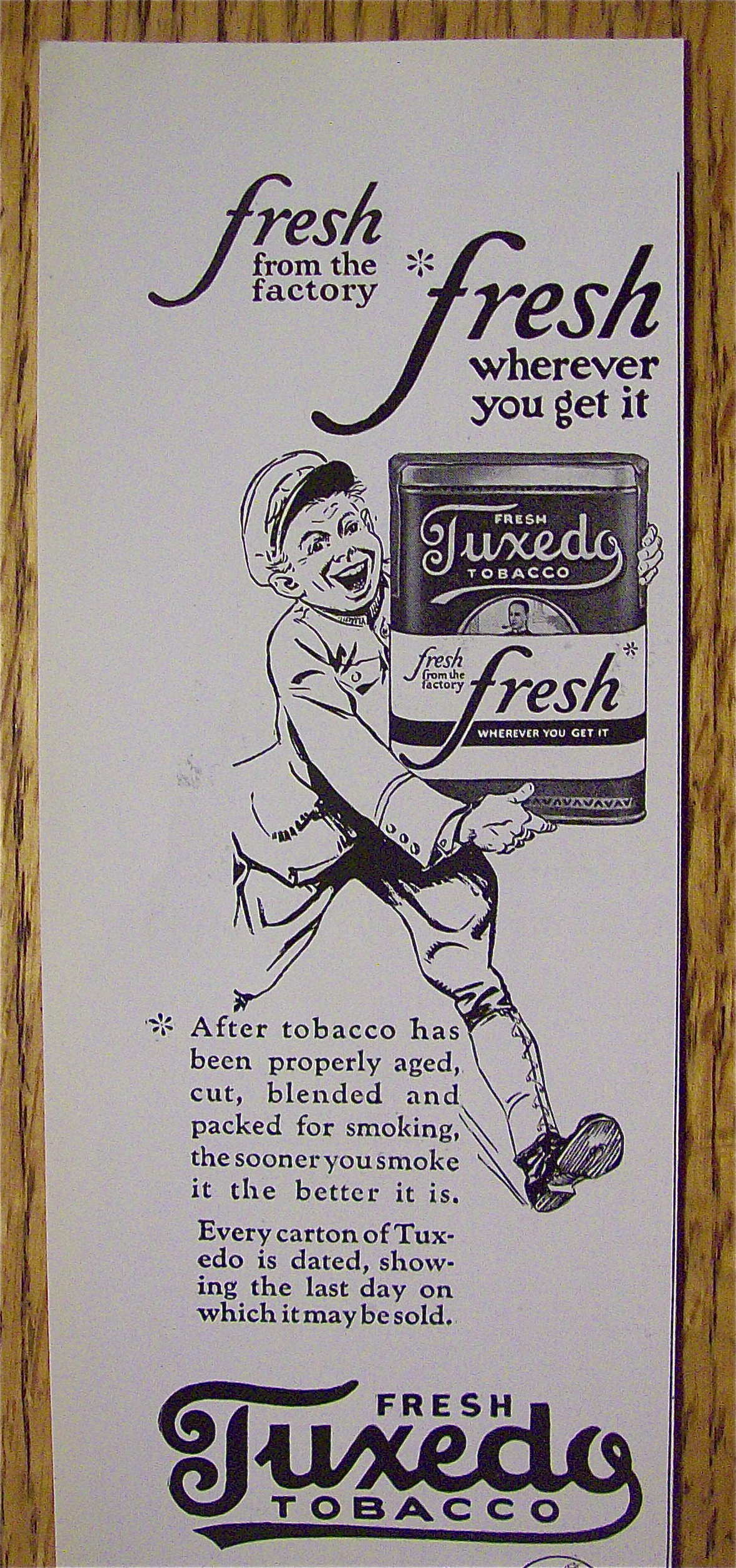1923 Tuxedo Tobacco With Man Carrying Can Of Tobacco