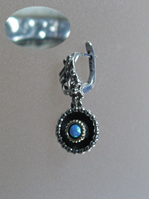 Sterling Silver Opal Pierced Earrings.