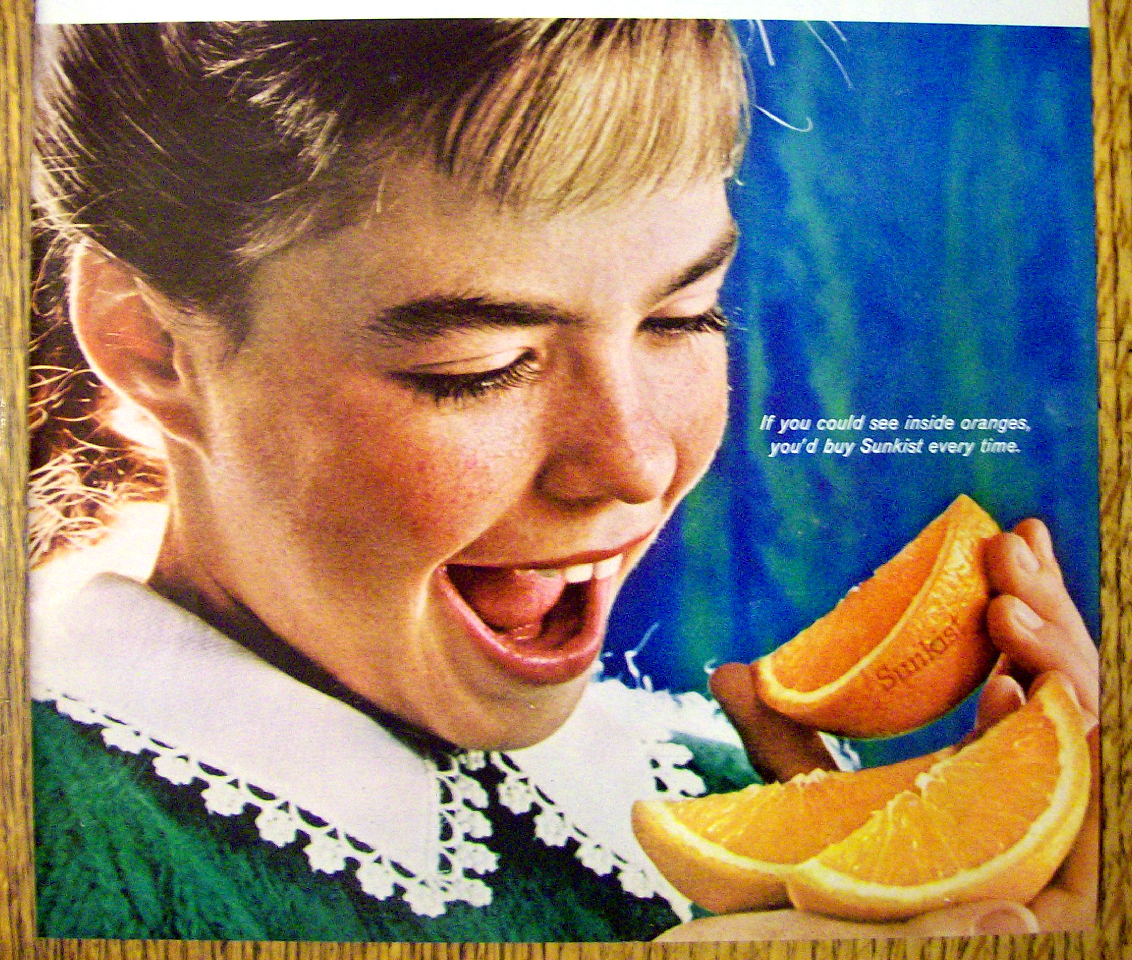 1965 Sunkist Oranges with Girl Eating Orange