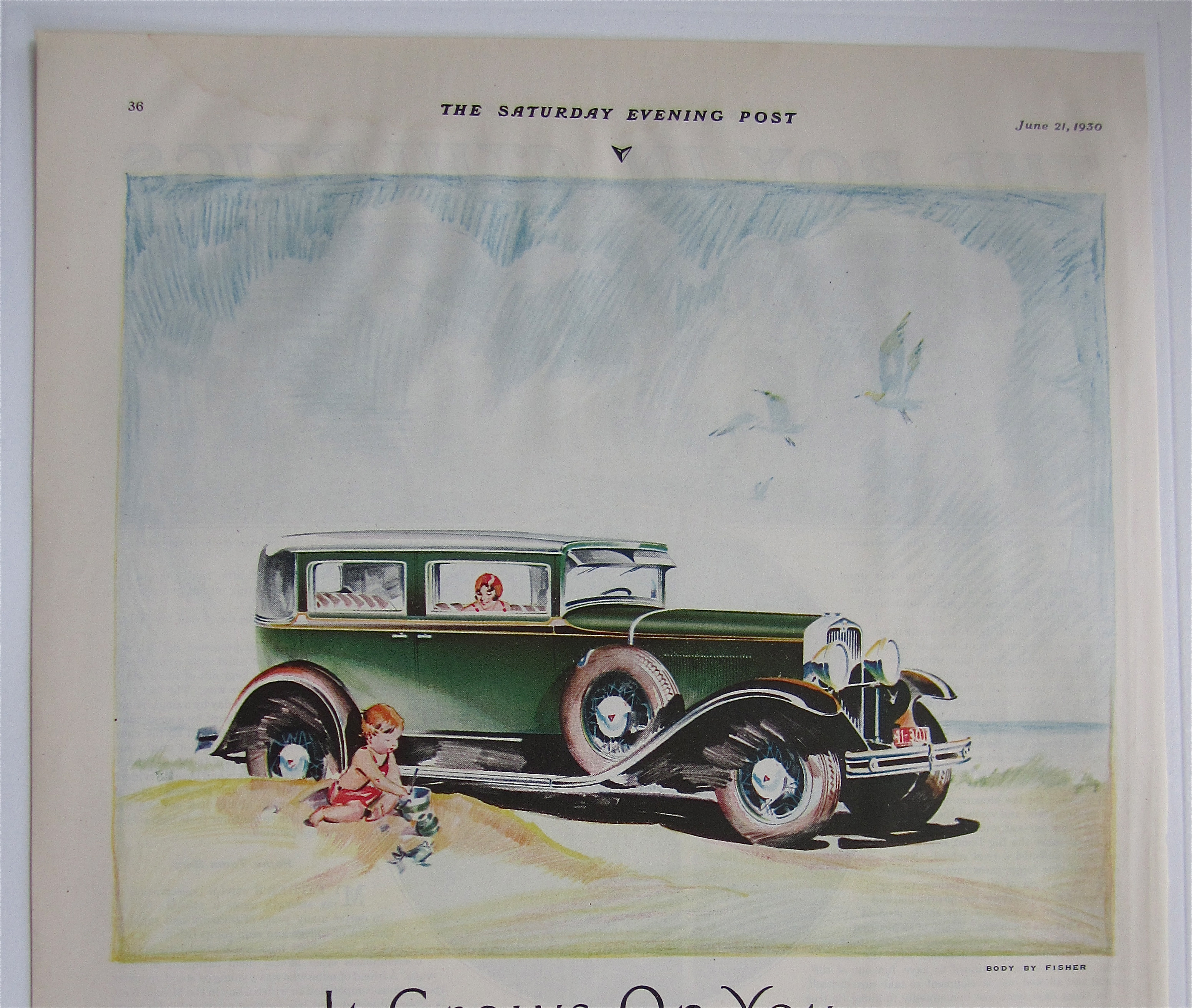 1930 Viking Eight with Woman & Child Playing In Sand