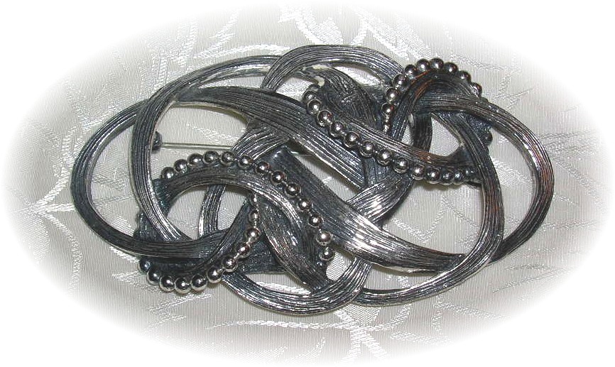 NAPIER Silver Knot Brooch