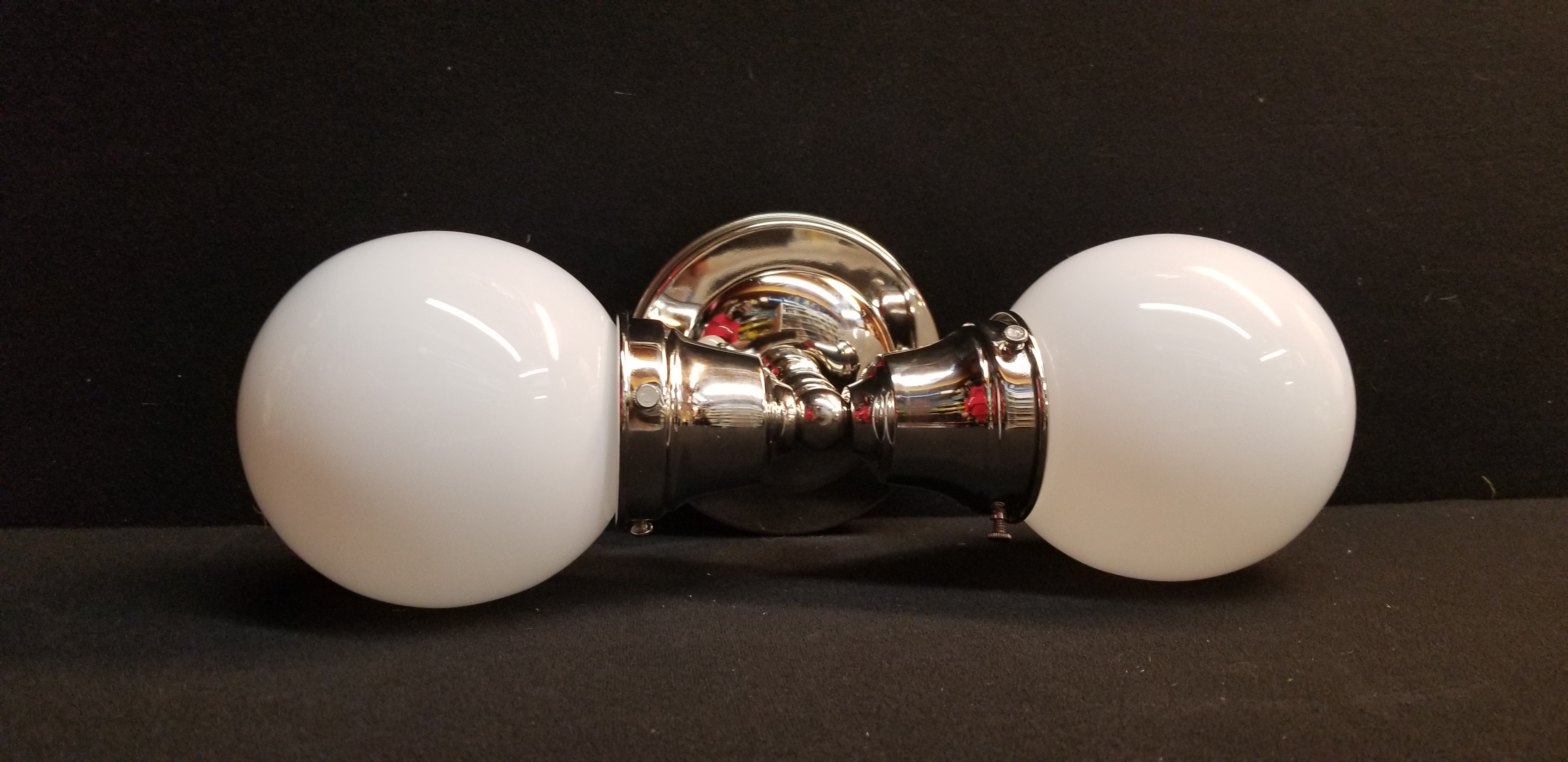Cool wall sconce in nickel